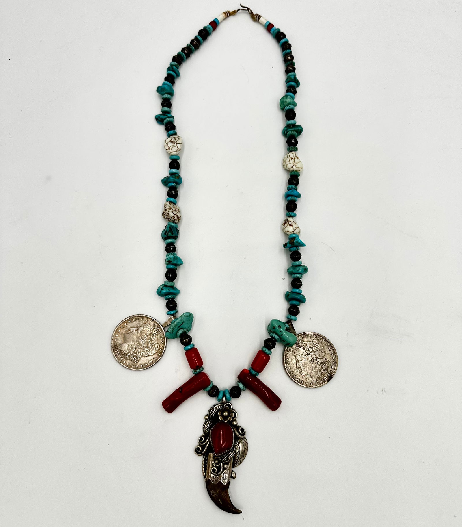 Frank Guerro Signed Native American Bear Claw Necklace W/ Morgan Dollars & Turqoise Coral: Frank Guerro Signed Native American Bear Claw Necklace W/ Morgan Dollars - this is Just Signed By Guerro with no Metal Purity Mark so While I would Assume they are Silver, I Cannot be Certain of or Gu
