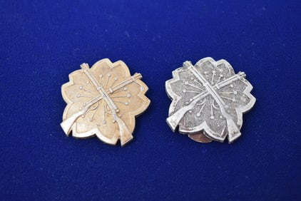 Pair of WWII Japanese Army Proficiency Rifle Badges