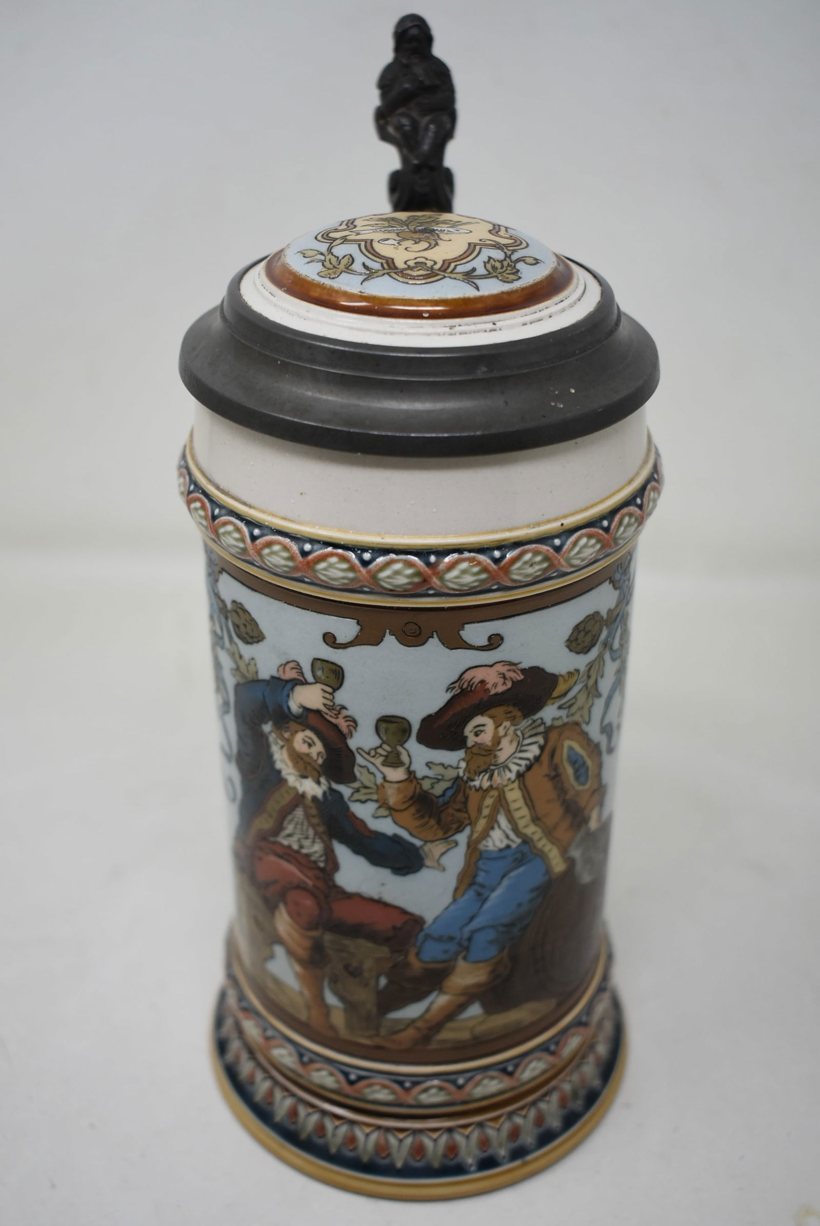 Mettlach #1932 1/2 Liter Beer Stein: Mettlach 1932 1/2 Liter Beer Stein. In excellent condition. Has light staining inside and very slight strap play.