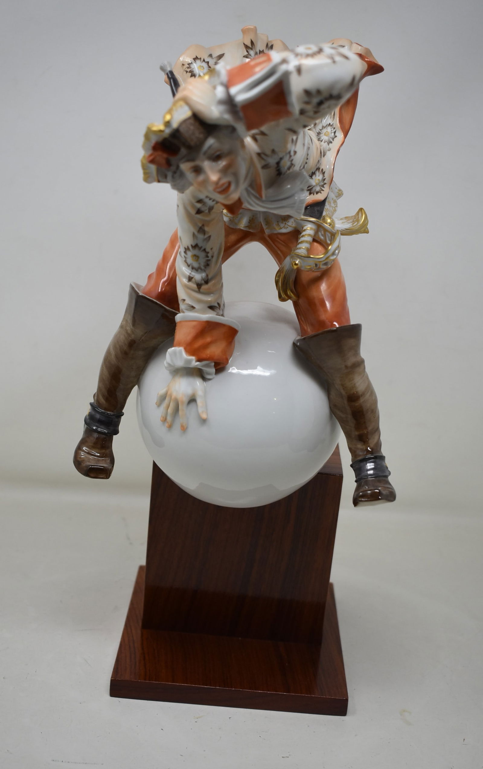 Meissen Baron Von Munchausen Porcelain Figure Numbered 22/250: Meissen Baron Von Munchausen Limited Edition Porcelain 15" Figure numbered 22/250. Designed by Alexander Struck, the Baron sits on a Porcelain Ball with a Wooden Base. This amazing piece is excellent