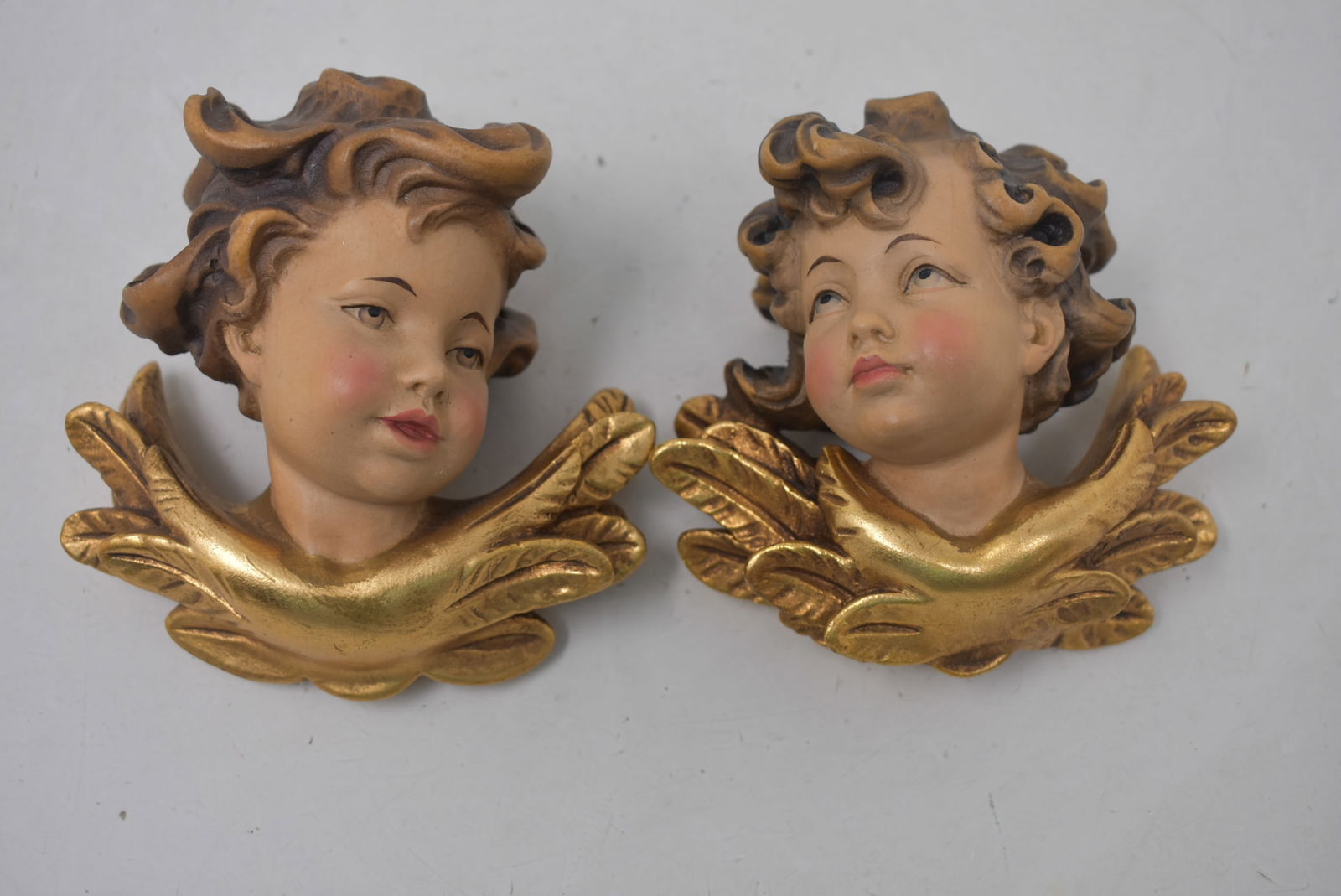 2 Anri Hand Carved Cherub Angel Wall Plaques: 2 Anri Hand Carved Cherub Angel Wall Plaques, 5". In excellent condition.