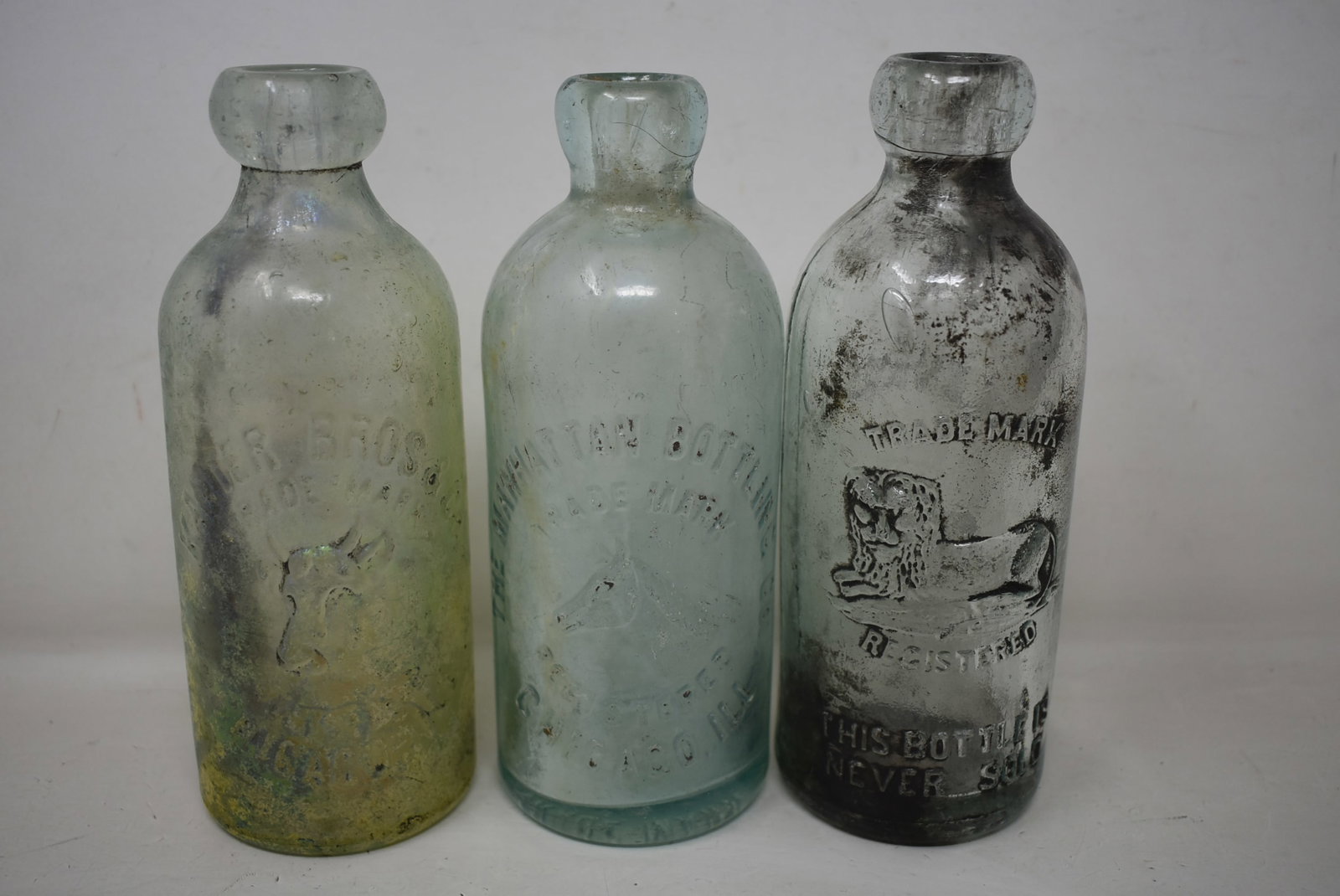 3 Vintage Chicago Blob Top Soda Bottles: Group of 3 Vintage Blob Top Chicago Soda Bottles, Manhattan, I. Levinson and Kanter Bros. As shown. The Levinson has a crack on blob.