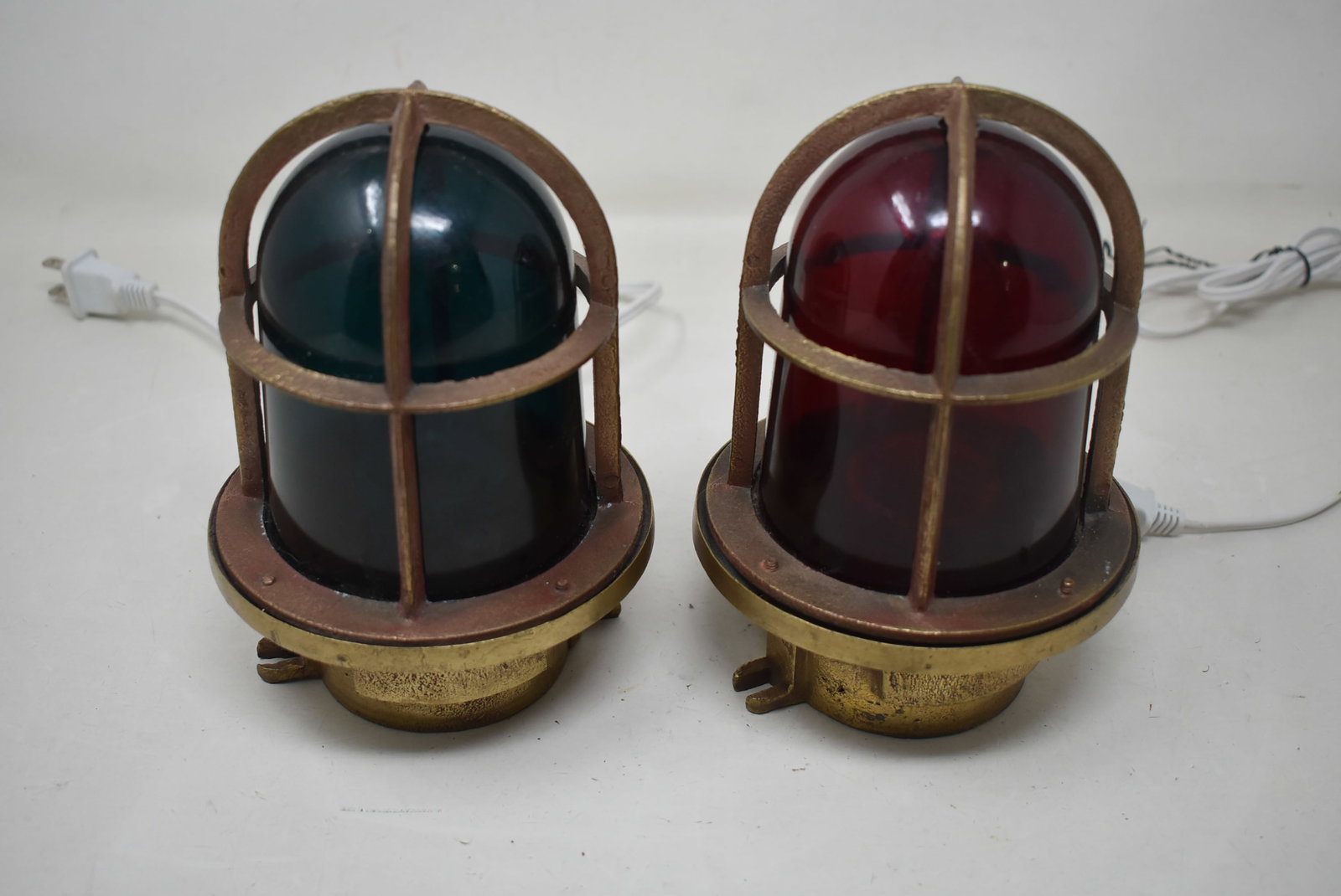 Pair of Vintage Solid Brass Nautical Ship Lights Green & Red: A Pair of Heavy Solid Brass Nautical Ship Lights, Red & Green with original glass domes. They measure 7" tall and have been electrified. In nice condition.