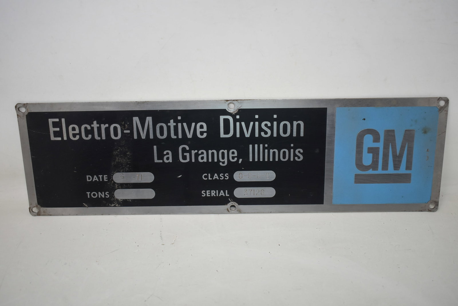 Vintage Electro Motive Division EMD Locomotive Builder's Plate 1971: Vintage Electro Motive Division EMD Locomotive Builder's Plate 1971. It measures 15"x4"