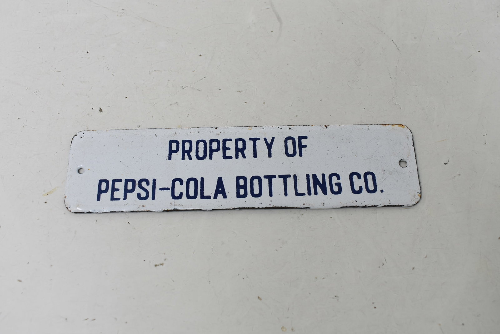 Vintage "Property of Pepsi-Cola Bottling Co" Porcelain Crate Tag: Vintage "Property of Pepsi-Cola Bottling Co" Porcelain Crate Tag. It measures 6"x1.5"
