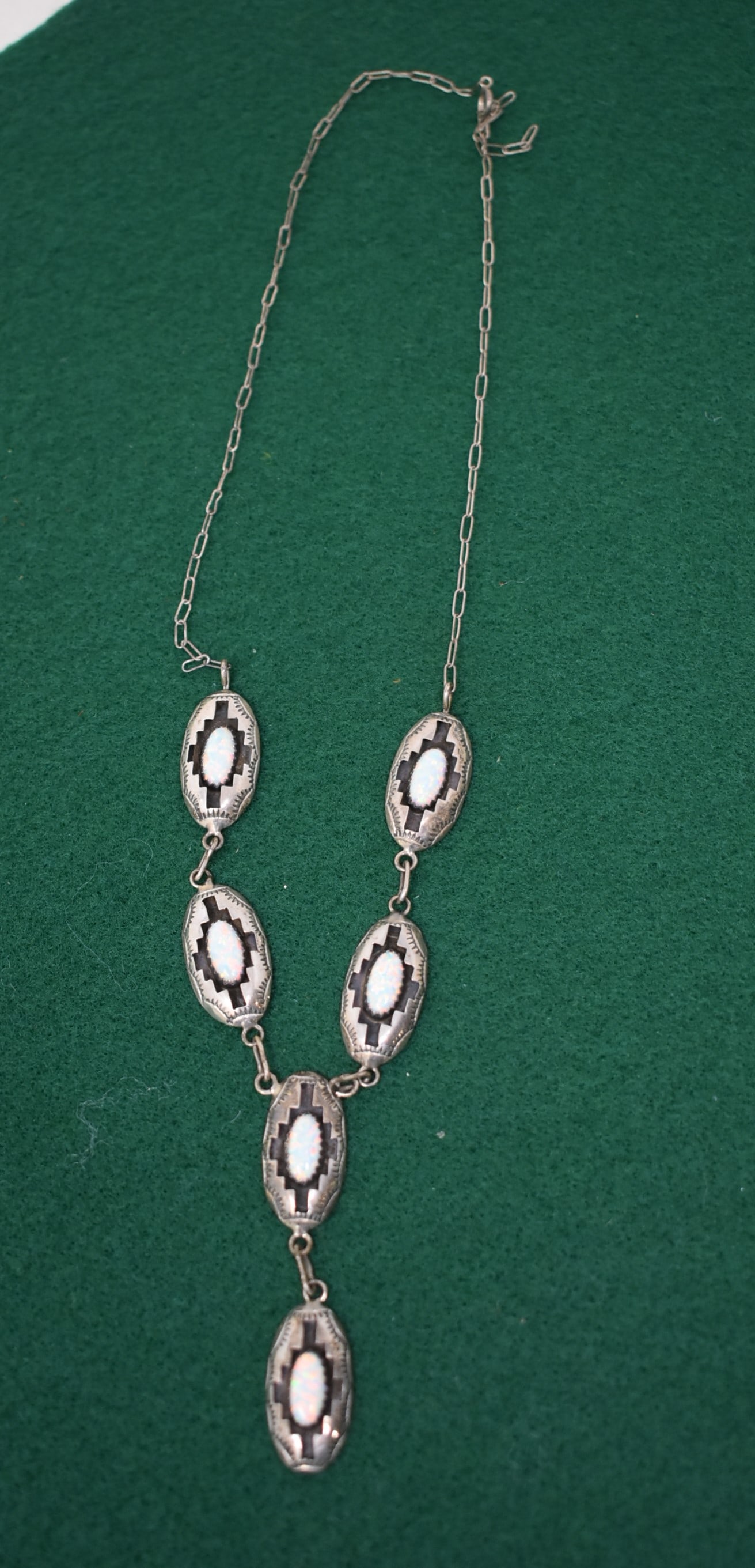 Sterling Silver & Opal Navajo Necklace Felix Penny: Felix Penny Sterling Silver and Opal 18" Necklace. The hoop at the end that hooks into the clasp is missing. It can still hooked through the chain. Otherwise nice condition.