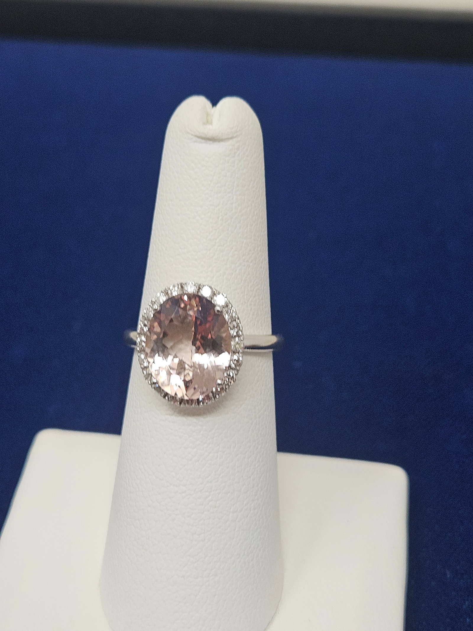 14K White Gold Morganite with Diamond Halo Ring: 14K White Gold Morganite with Diamond Halo Ring, size 6. It weighs 4.1 Grams