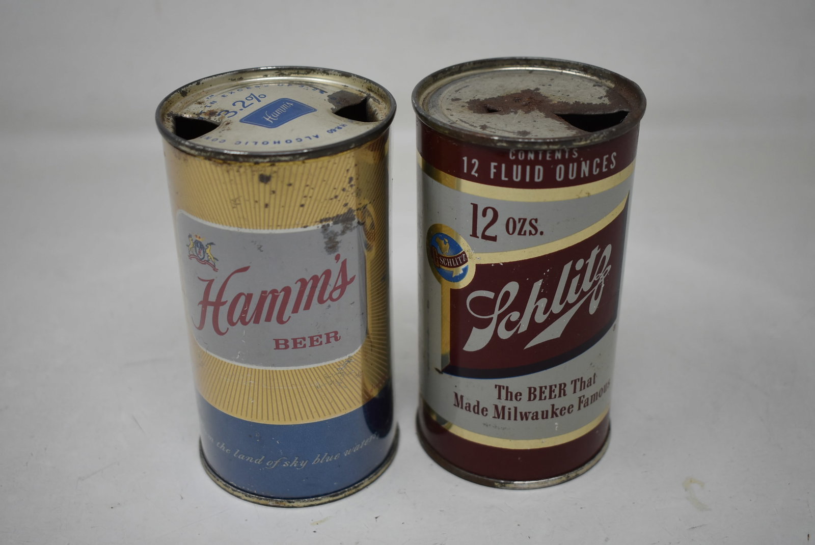 Schlitz and Hamm's Flat Top Beer Cans: A Schlitz and a Hamm's Flat Top Beer Can. See photos for condition.