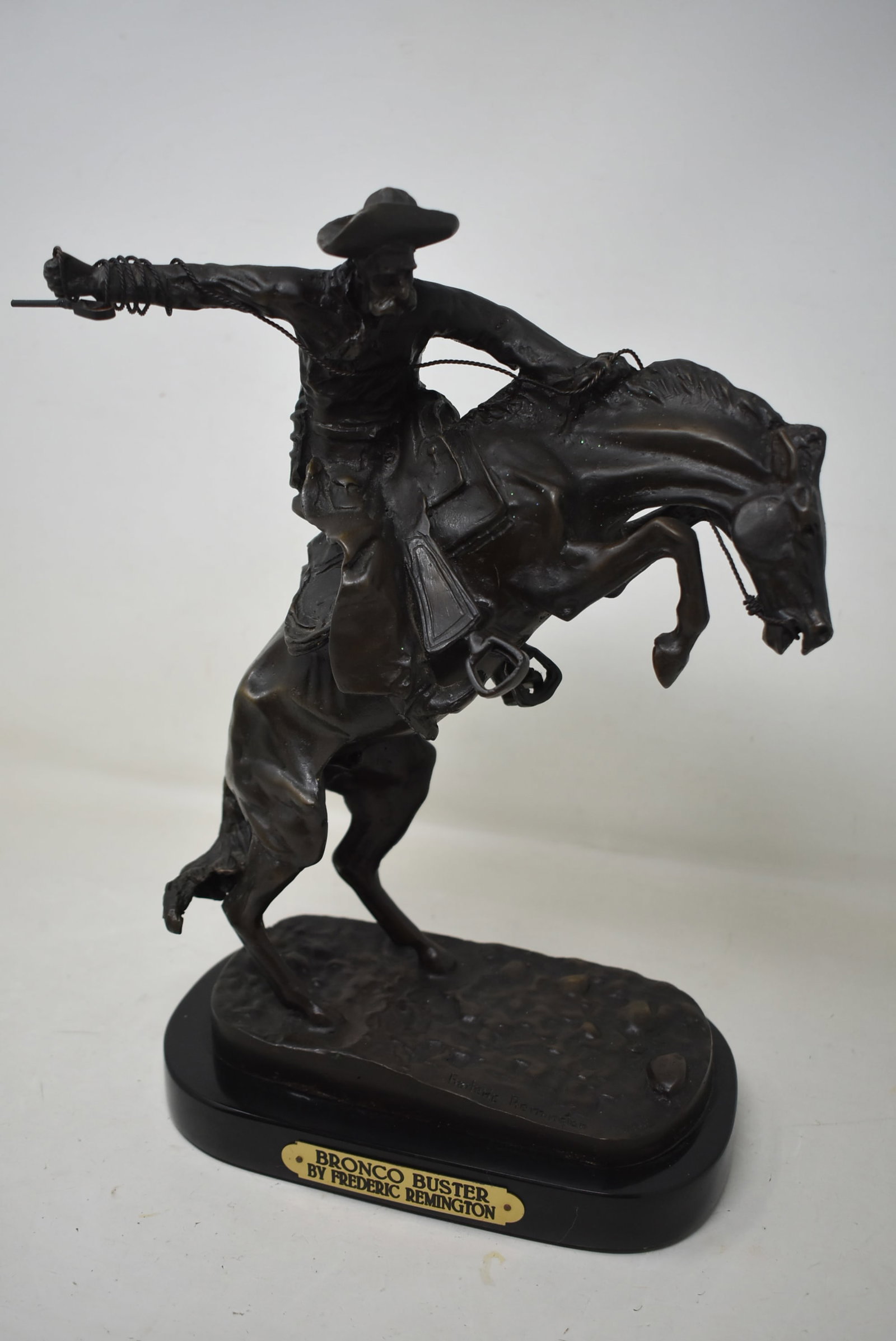 Frederic Remington "Bronco Buster" Bronze Sculpture on Marble Base: Vintage 13" Frederic Remington "Bronco Buster" Bronze Sculpture on Metal Base. In nice condition.