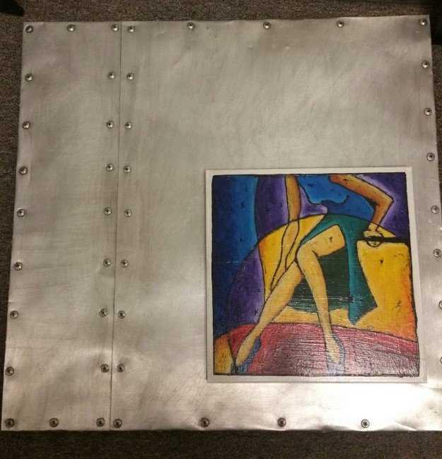 Christopher Martino -Anonymous 15 (Woman with Bag): Metal Wrapped Board w/Raised Tile, 2002, 25" x 24." C Martino is a Southern California contemporary artist and curator battling generic environments and boring spaces everywhere. He explores the ever-