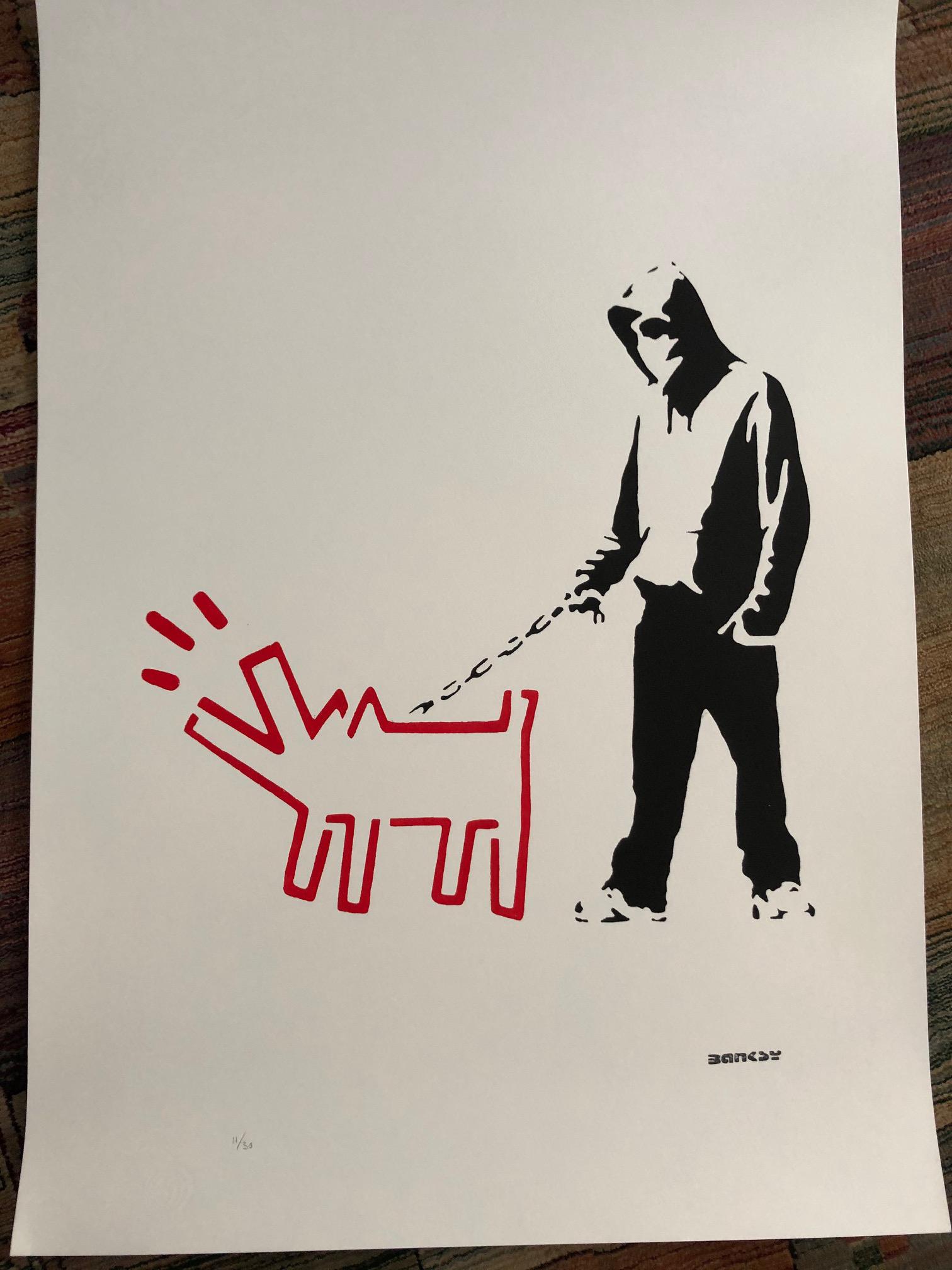 Banksy (After) - "Hoodie and Keith Haring Red Dog": (After) Banksy (b. 1975) "Hoodie and Keith Haring Dog (Red)"(2017) is a reproduction, Stencil Street Art; Large size Stencil/Paint. Edition 11 of 30. Signature imprimee (stamped.) Hand numbered in pen