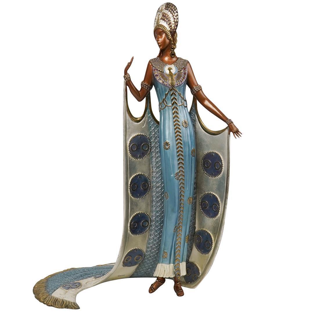 Erte - Iras: Romain de Tirtoff "Erte" (1892-1990, (Russian/French) “Iras” (1990) Limited Edition Art Deco Bronze sculpture of a woman in an ornate gown with a patina of light blue, gold and white gold leaf. Th