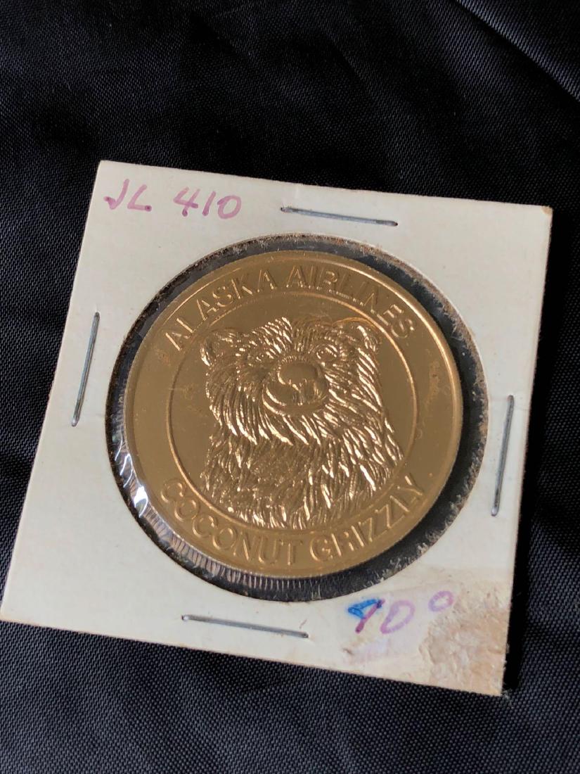 Alaska Airlines 1970's Coconut Grizzly Drink Coin (1 of 3)