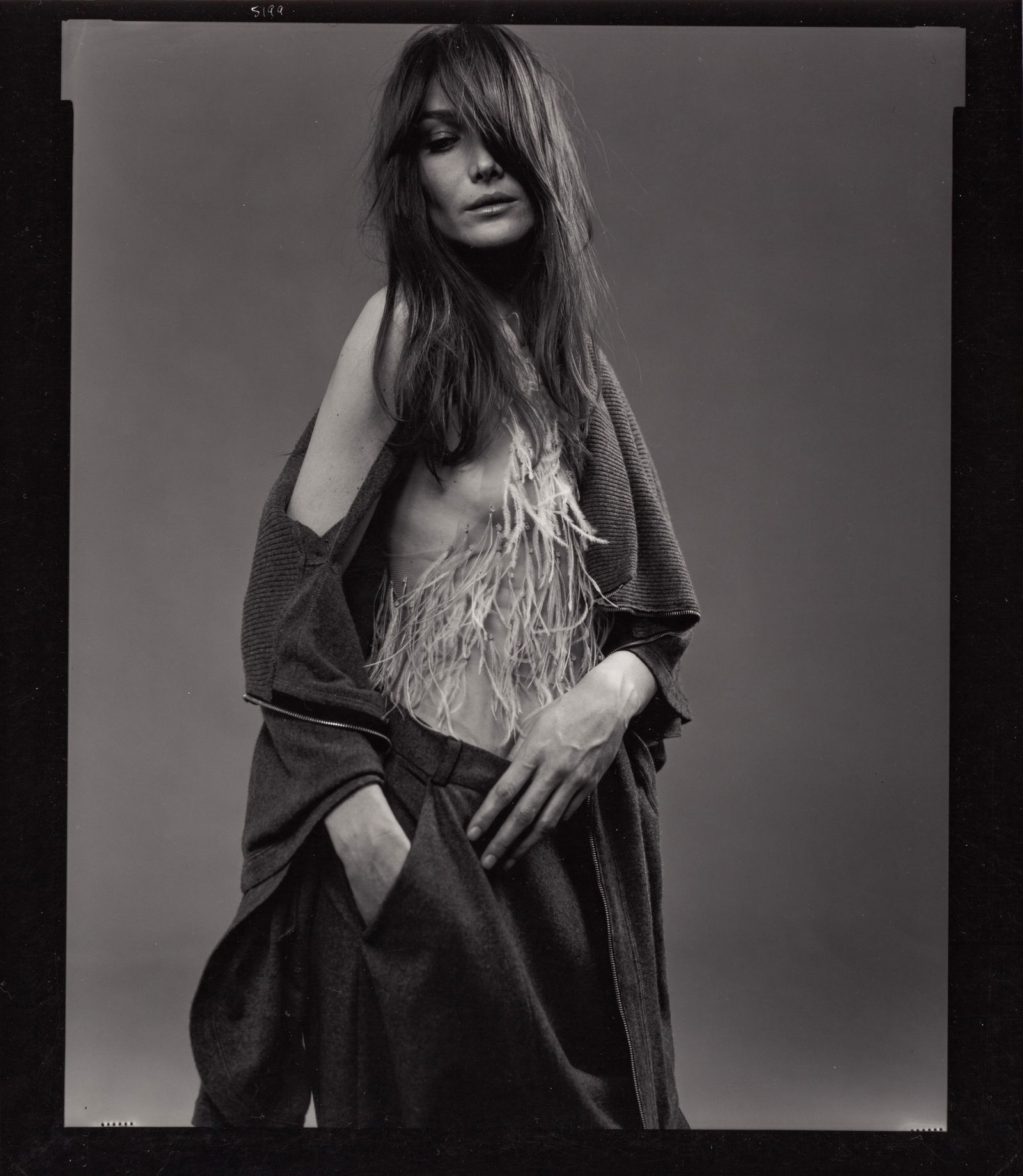 MICHEL COMTE (* 1954): MICHEL COMTE (* 1954)Carla Bruni, Paris 2003Gelatin silver print, contact print 8 x 10 in Studiolabel on the top of the print