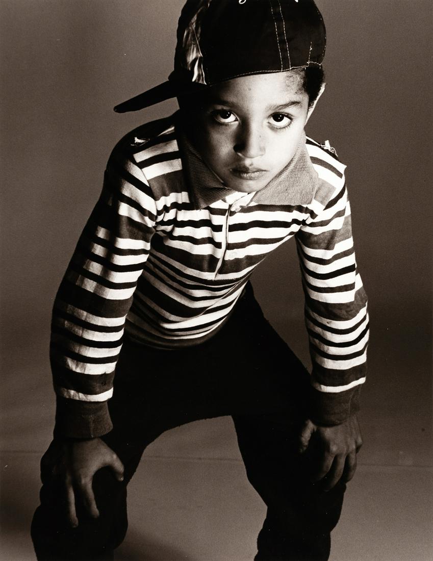 MARY ELLEN MARK (1940–2015): MARY ELLEN MARK (1940–2015) | Homeless Kid, New York 1988 | Gelatin silver print | 45,4 x 35,1 cm | Credited and annotated by an unidentified hand in pencil on the reverse