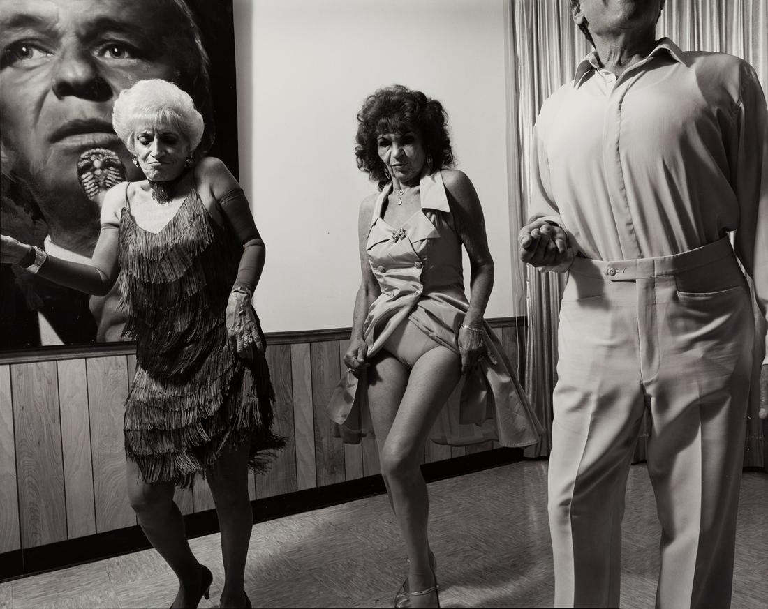 MARY ELLEN MARK (1940–2015): MARY ELLEN MARK (1940–2015) | Miami Gigolos 93 in Luigi's Italian American Club, Florida 1993 | Gelatin silver print, selenium toned | Size: 38 x 48,3 cm | Signed and numbered by the photographe