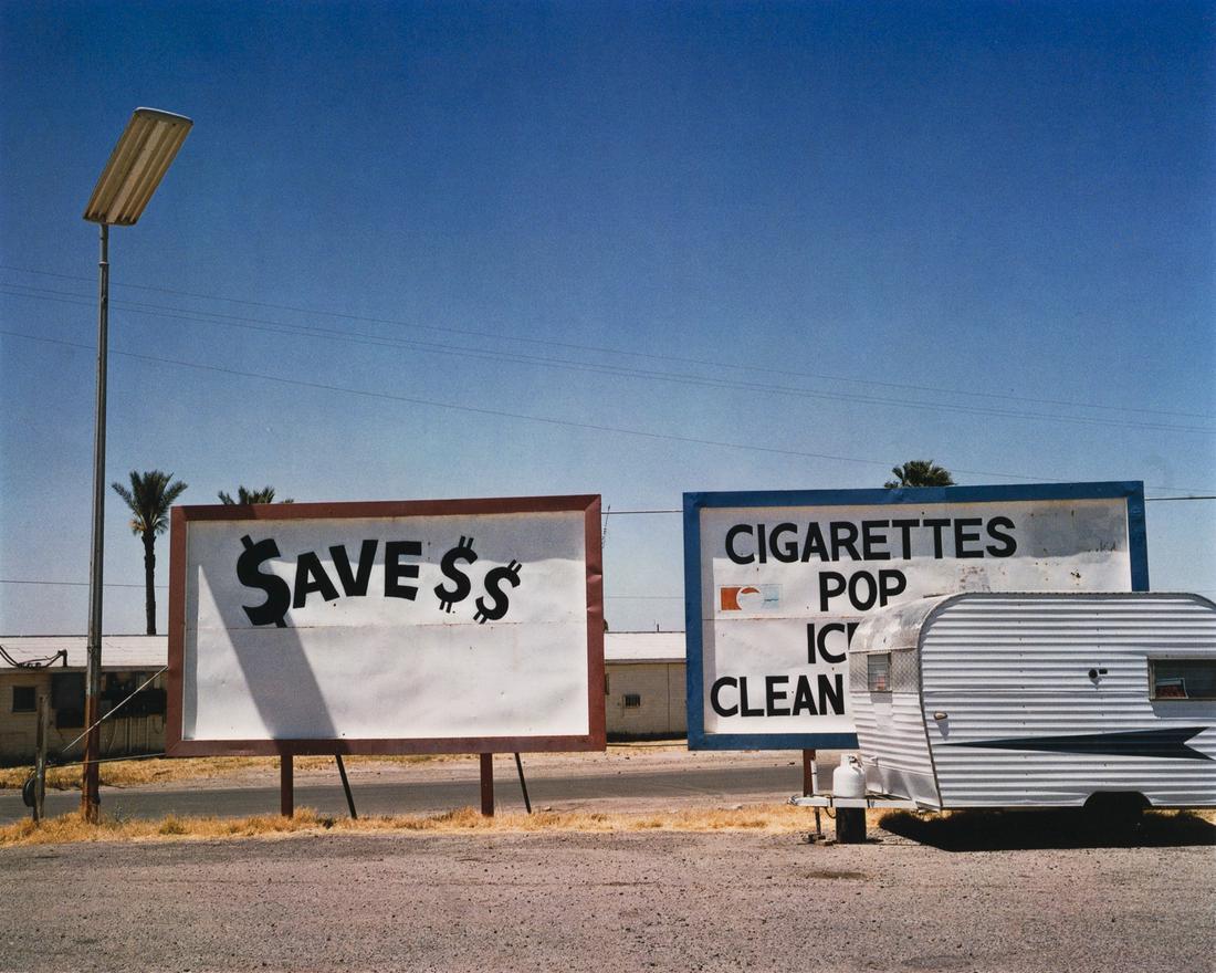 WIM WENDERS (* 1945): WIM WENDERS (* 1945) | ‘Ave Dollars, Gila Bend, Arizona’ (from ‘Written in the West’), 1983 | Dye transfer print| Size: 33,5 x 42 cm | Signed, dated and numbered by the photogr