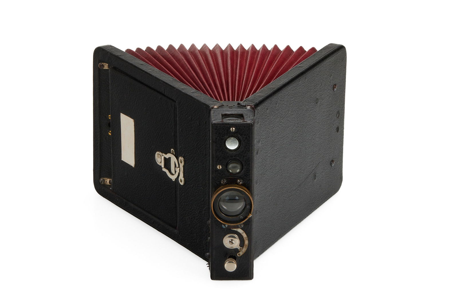 Vega S.A., Switzerland Vega Book Camera: Year/Baujahr: c.1900 Condition/Zustand: B/A English Rare book-style camera for plates 9x12cm, red leather bellows, Aplanat lens, guillotine shutter 1/2-1/100, in excellent condition. <