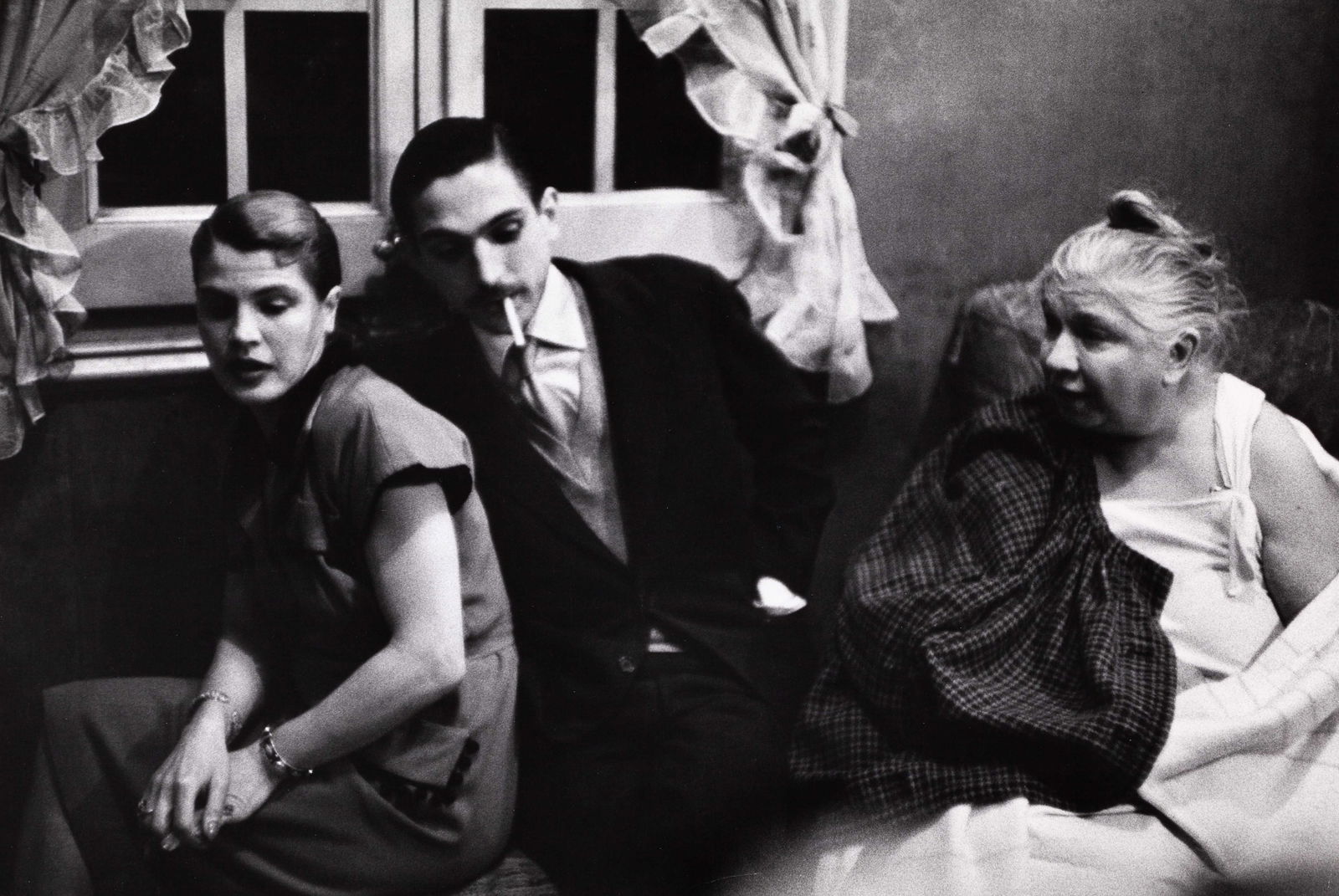 INGE MORATH (1923–2002): INGE MORATH (1923–2002) | Picasso's sister Lola Ruiz Vilato with two of her children, 1954 Image Size: 22.8 x 33.9 cm English Vintage silver print on double-weight semi-matte paper, in very good