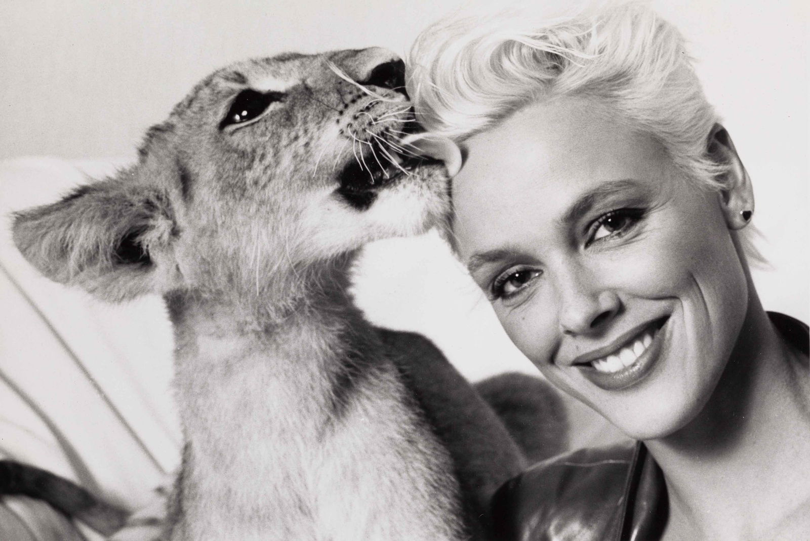 GREG GORMAN (*1949) | Brigitte Nielson, 1987: Vintage print, 17 x 25 cm, stamped