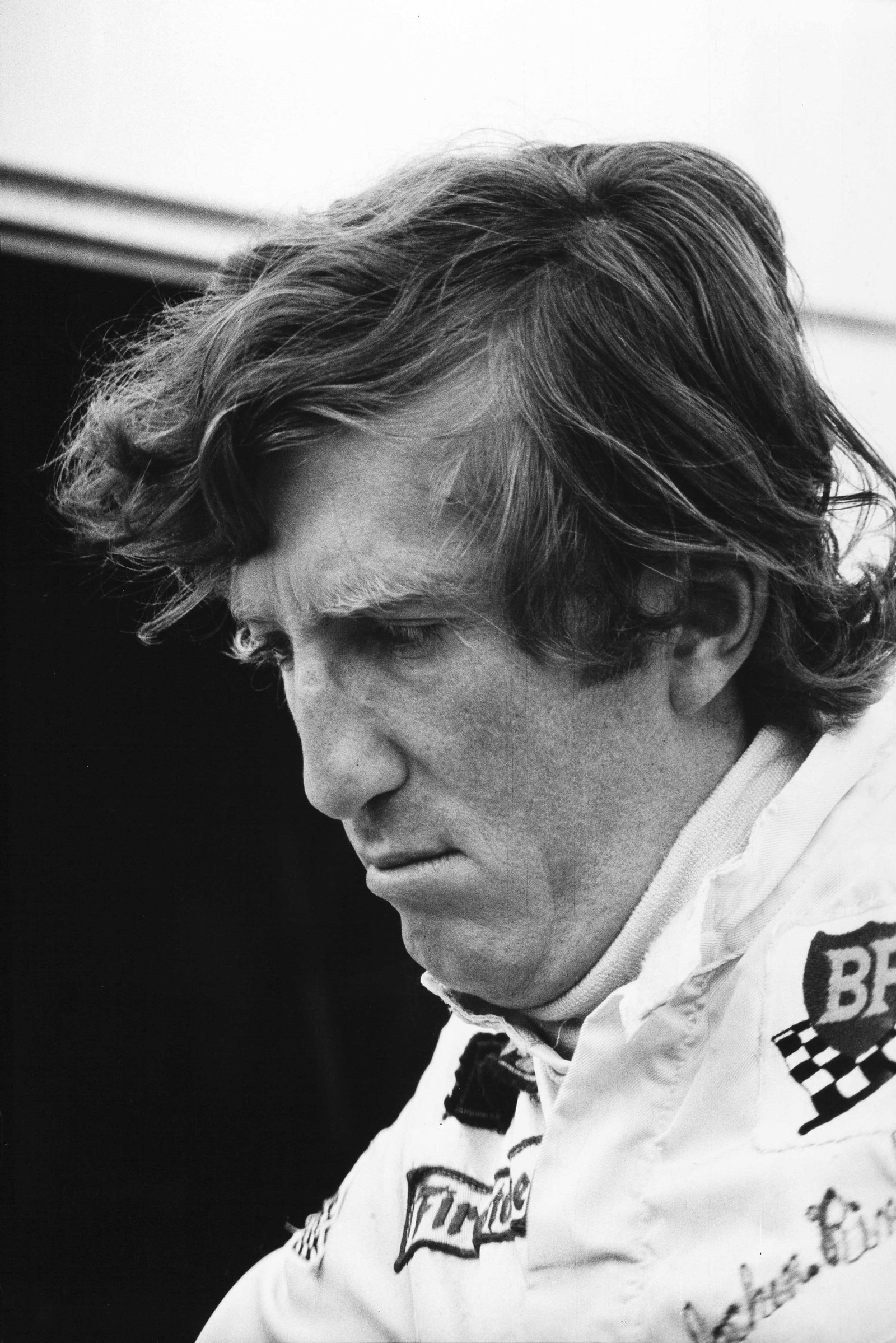 PETER COELN (*1954): PETER COELN (*1954) | Todesahnungen?', Jochen Rindt at the Salzburgring, Austria, August 30, 1970 Image size: 61.5 x 41.5 cm English Gelatin silver print, printed later on double-weight matte paper 63