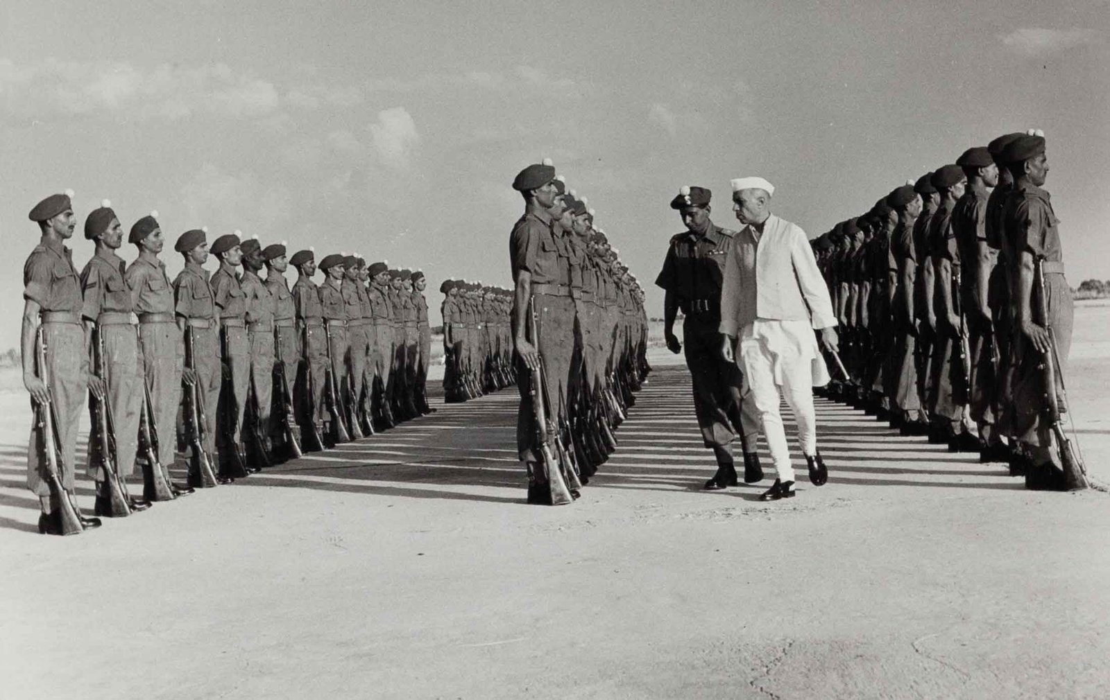 Prime Minister Jawaharlal Nehru, 1949: Vintage print, stamped, 10 x 16 cm Press Information Bureau India The Prime Minister inspects a Guard of Honour before departing from Ferozepur, Punjab, on September 18, 1949. The visit took place onl