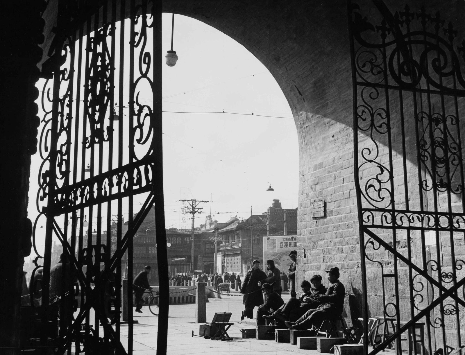 FERNAND GIGON | Beijing, China , 1956: Vintage print, stamped, 18 x 24 cm Aldo Palazzi The photograph was taken through one of the arched gateways in Beijing?s former city wall, whose gates and ramparts still marked the boundary between th