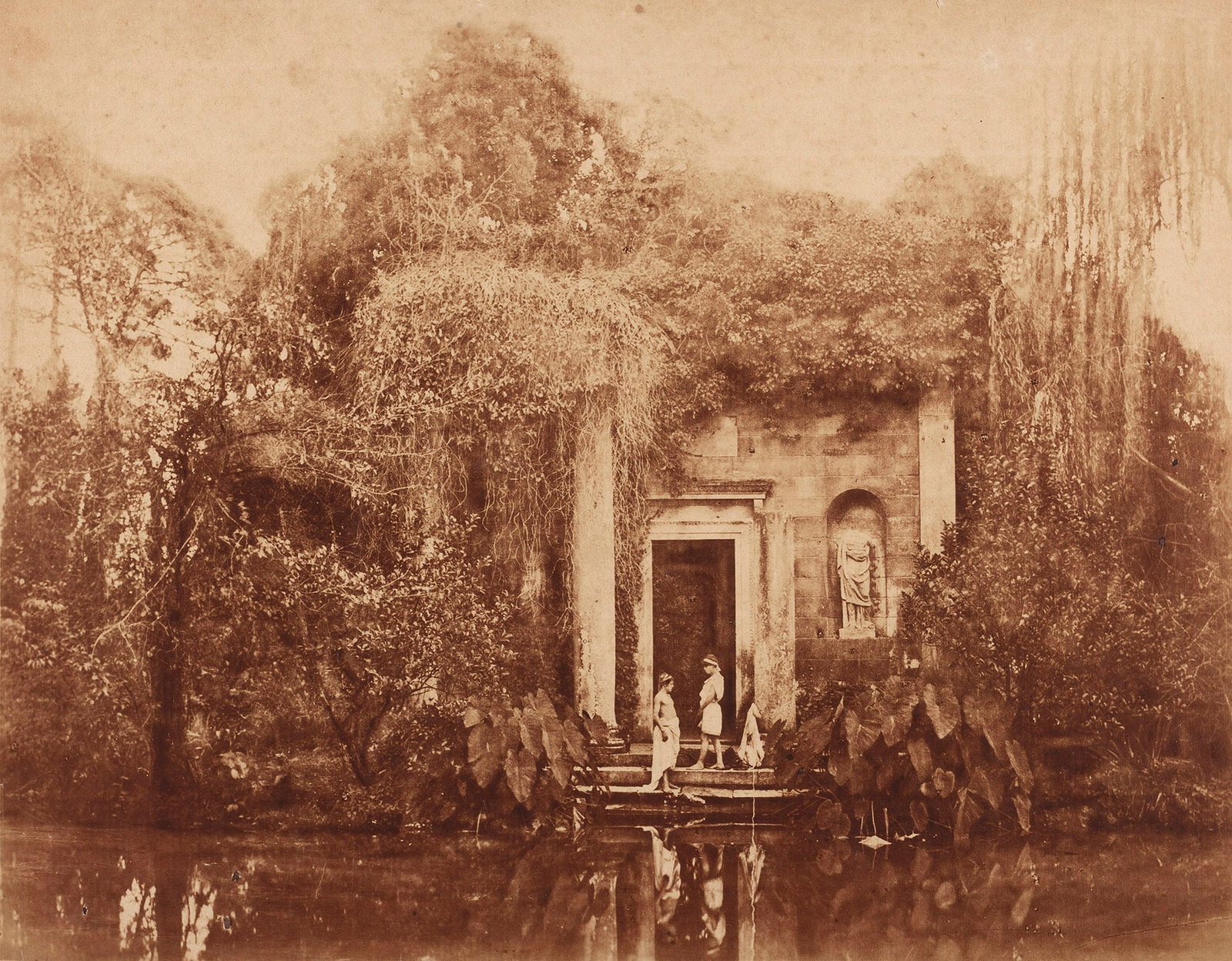 WILHELM VON GLOEDEN (1856–1931): WILHELM VON GLOEDEN (1856–1931) | The Temple in the English Garden of the Royal Palace of Caserta, Campania c. 1893 Image Size: 28 x 36.7 cm English Saltpaper print on brown hand-made paper