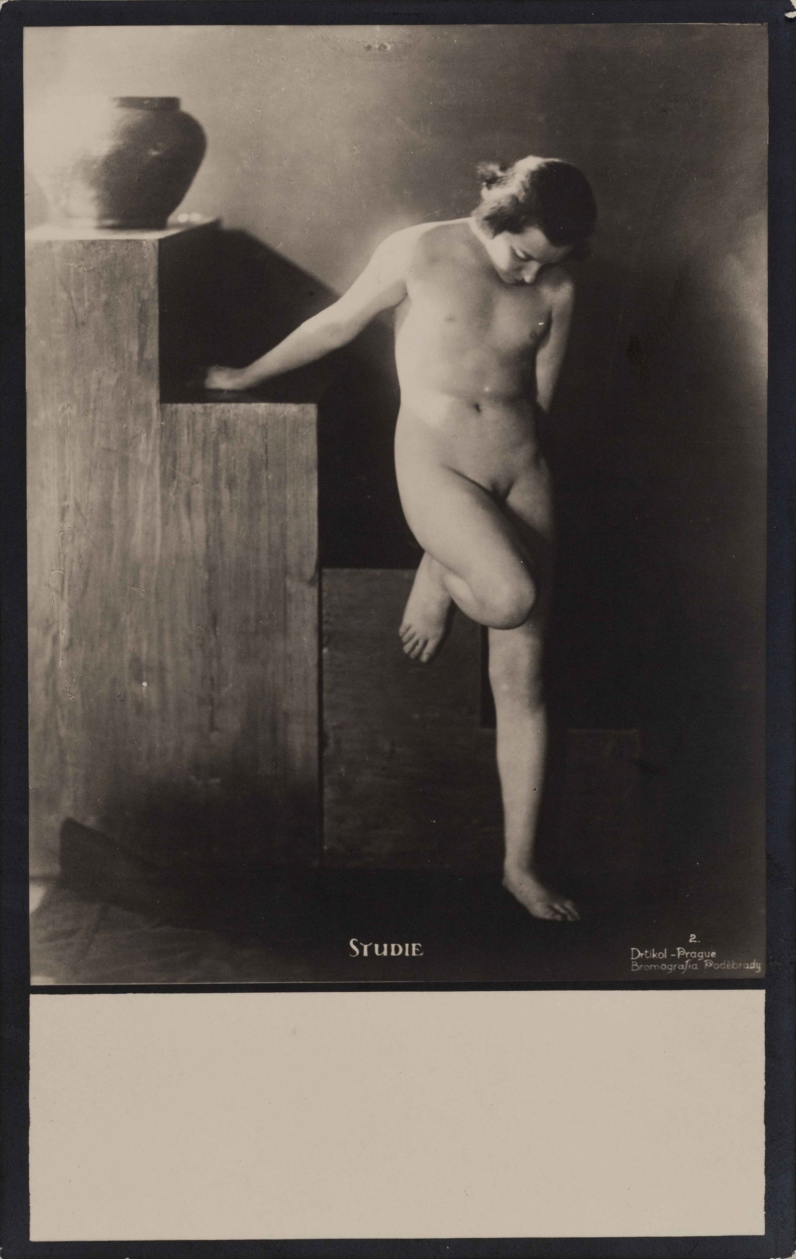 FRANTIŠEK DRTIKOL (1883–1961): FRANTIŠEK DRTIKOL (1883–1961) | Nude on stairs, Prague c. 1913 Image Size: c. 10.5 x 8 cm English Gelatin silver print, printed in the 1920s on postcard paper 13.7 x 8.7 cm, in very good