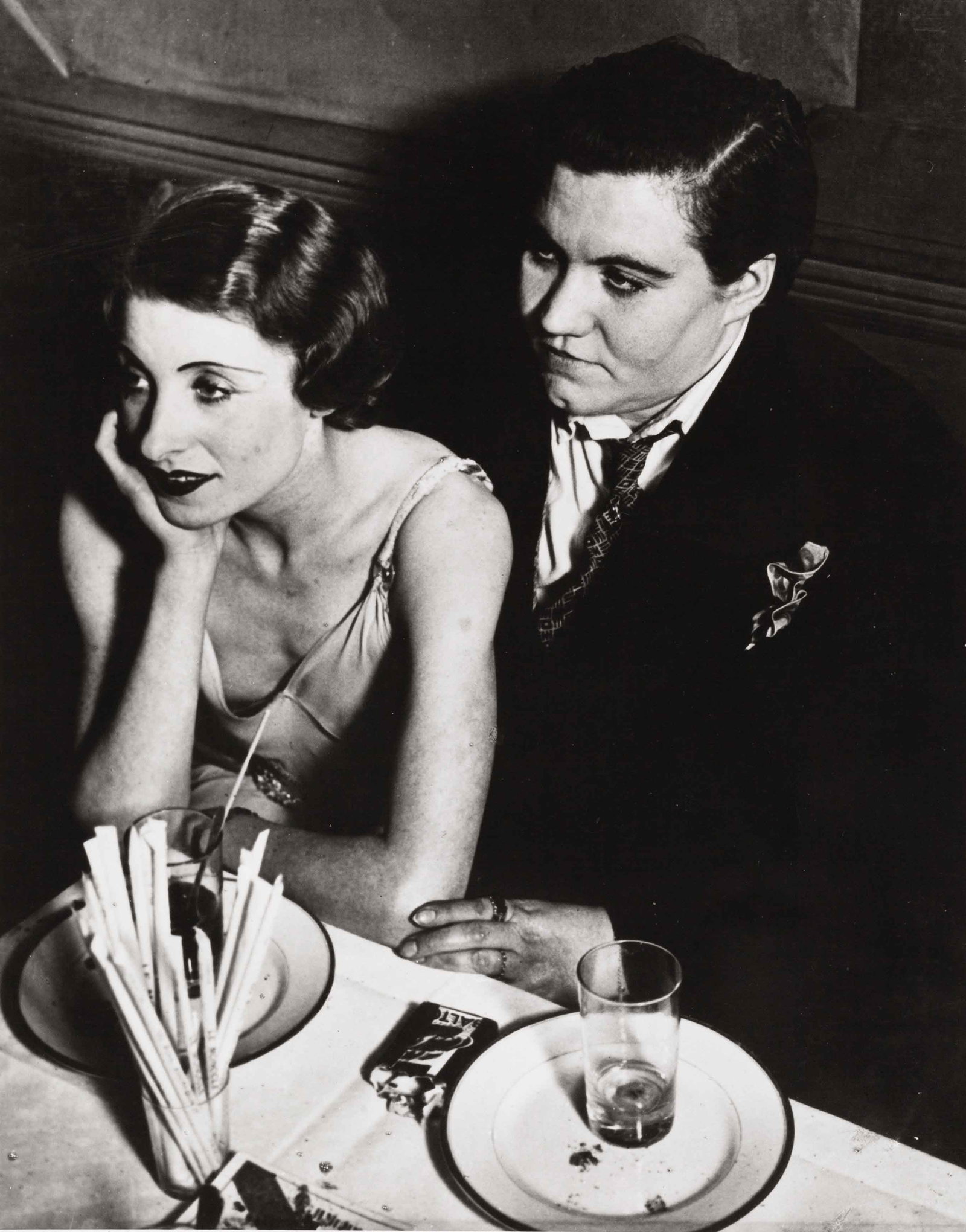 BRASSAÏ (1899–1984): BRASSAÏ (1899–1984) | 'Fat Claude' and her girlfriend at the 'Monocle', Paris c. 1932 Image Size: c. 20.5 x 16 cm English Gelatin silver print, printed 1990 by Yvon Le Marlec, 24 x 18.5
