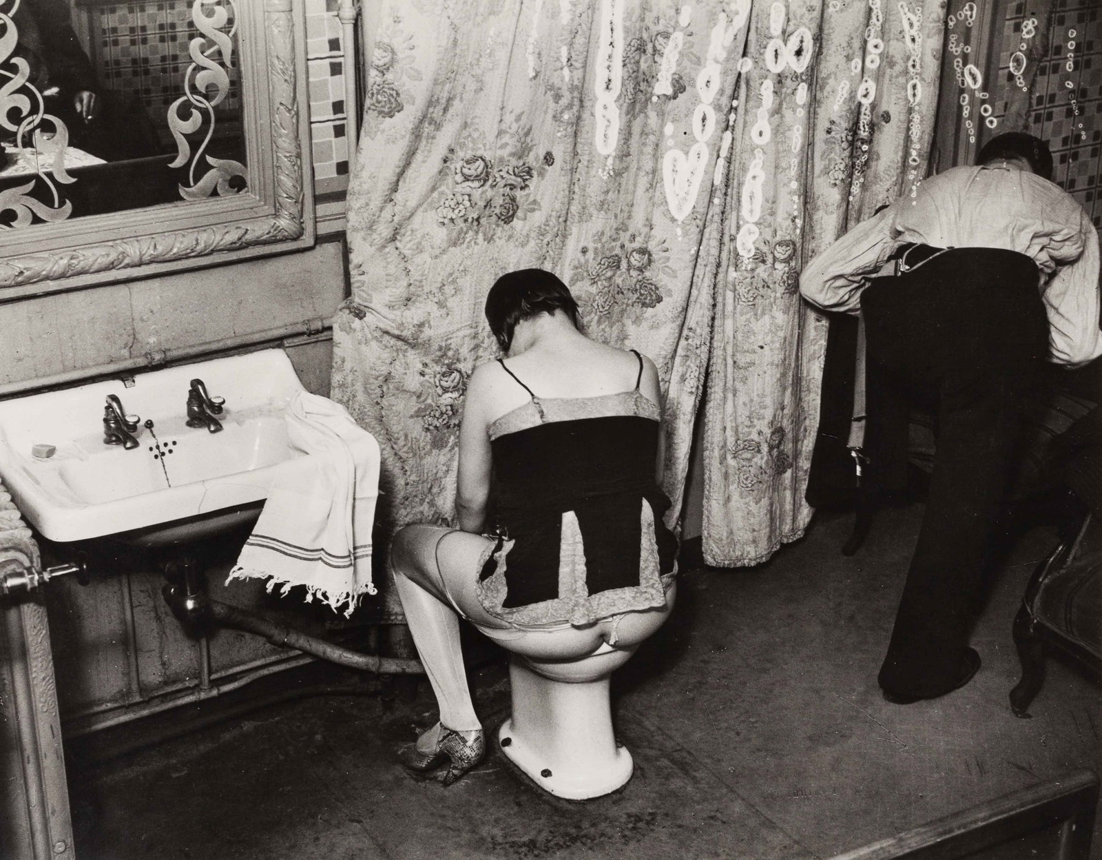 BRASSAÏ (1899–1984): BRASSAÏ (1899–1984) | 'La toilette' in the brothel at rue Quincampoix, Paris 1932 Image Size: 27.8 x 35.6 cm English Gelatin silver print, printed in 1988 by Yvon Le Marlec on Agfa paper,