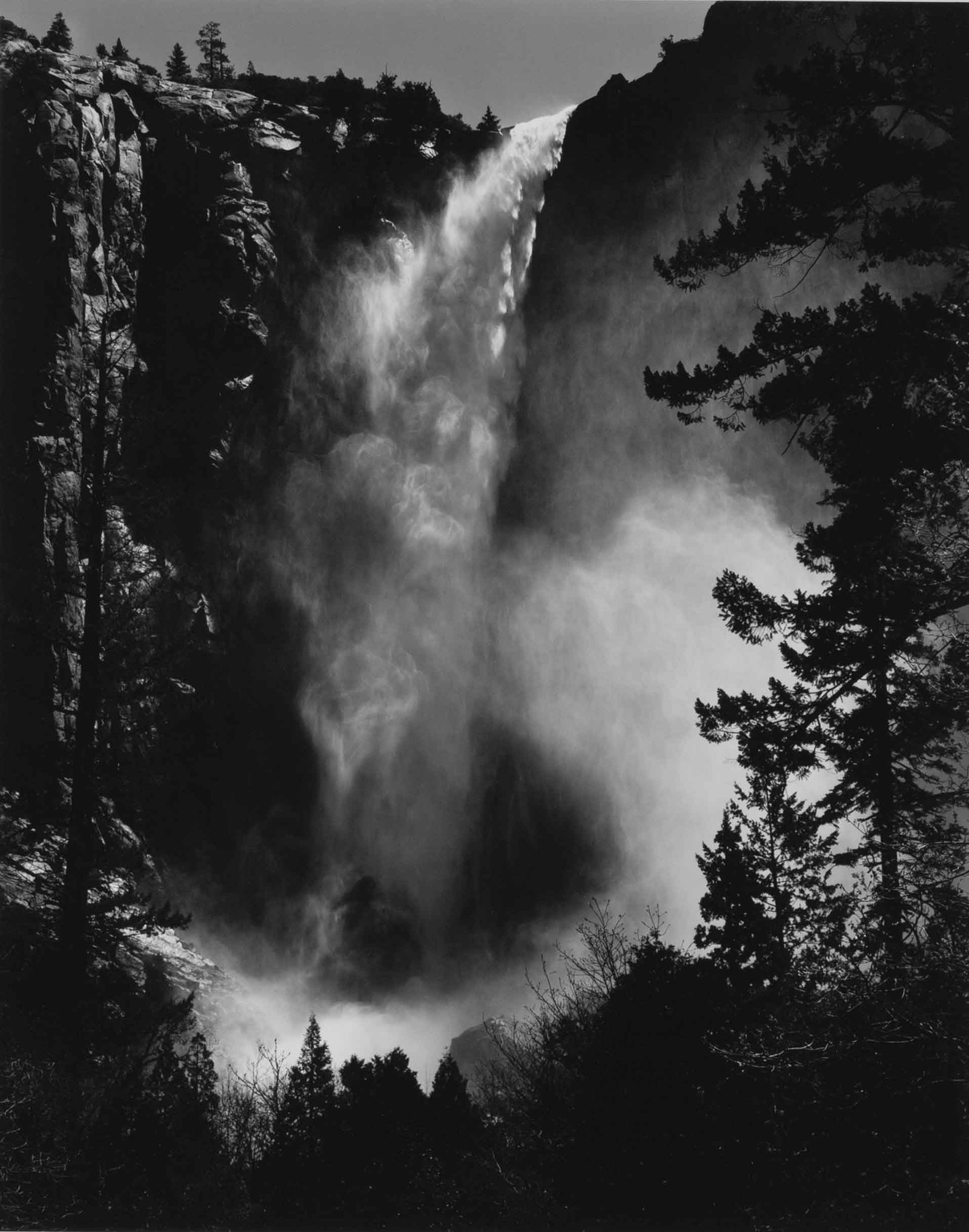 ANSEL ADAMS (1902–1984): ANSEL ADAMS (1902–1984) | Bridal Veil Fall, Yosemite National Park, California, 1927 Image Size: 23.7 x 19 cm English Gelatin silver print, printed later by Alan Ross, flush-mounted on edition