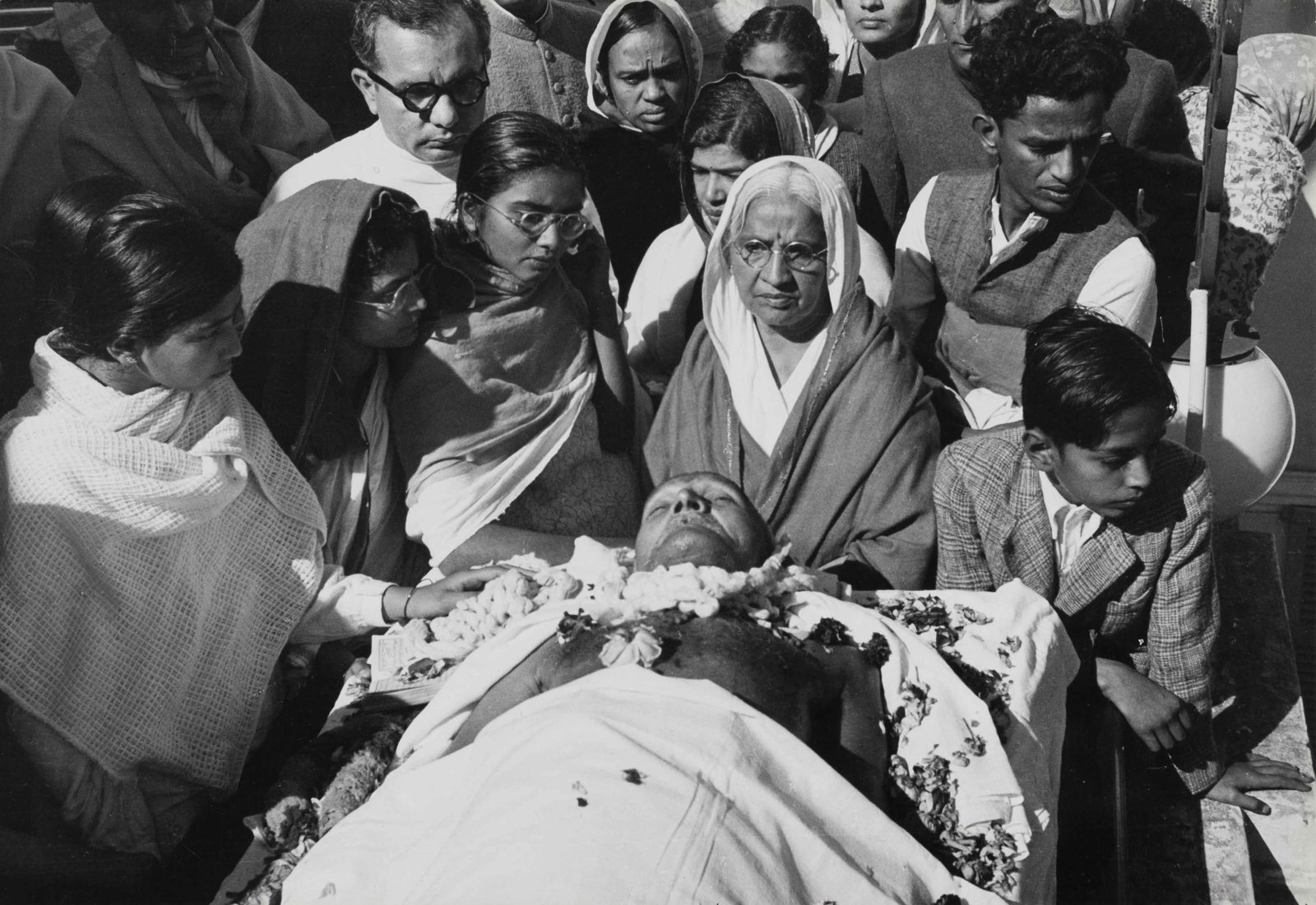HENRI CARTIER-BRESSON (1908–2004): HENRI CARTIER-BRESSON (1908–2004) | Gandhi's wake at Birla House, Delhi, India 1948 Image Size: 17.6 x 25.5 cm English Gelatin silver print, printed c. 1960 on single-weight, glossy paper, in