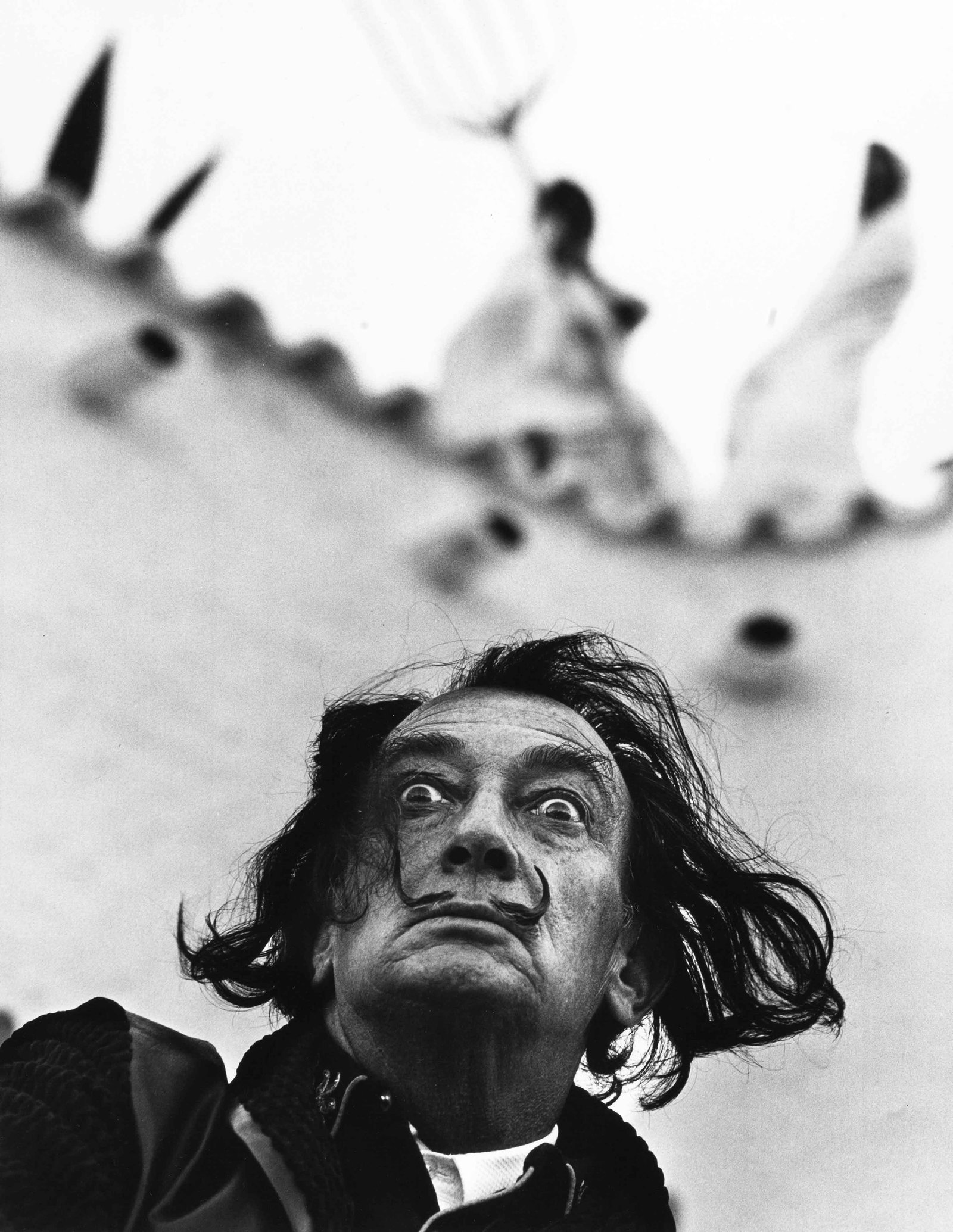 PHILIPPE HALSMAN (1906–1979): PHILIPPE HALSMAN (1906–1979) | 'Dalí in Port Lligat', 1964 Image Size: 32.9 x 25.4 cm English Gelatin silver print, printed in 1981, 35.4 x 28 cm, in very good condition. Photographer's