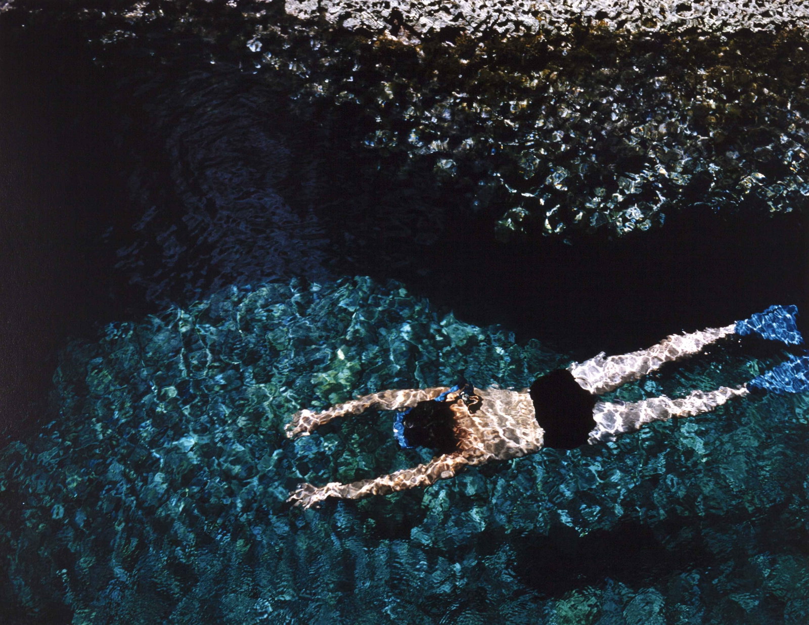 ERNST HAAS (1921–1986): ERNST HAAS (1921–1986) | 'The swimmer', Greece 1970 Image Size: 46,6 x 66 cm English Archival pigment print on fine art paper 50.8 x 76.5 cm, in excellent condition. Photographer's studio stamp