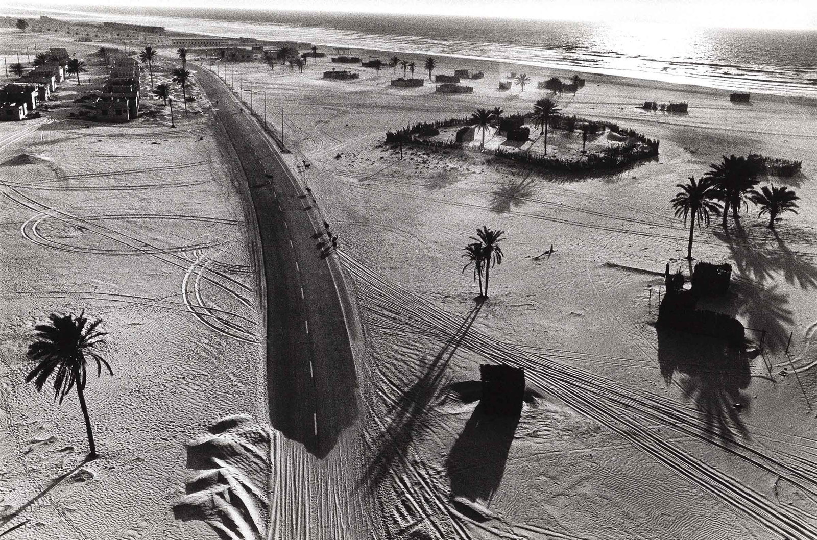 RENÉ BURRI (1933–2014): RENÉ BURRI (1933–2014) | Road from Abu Dhabi to Dubai, United Arab Emirates 1975 Image Size: 37.9 x 56.4 cm English Gelatin silver print, printed in 1989, 49.8 x 60.4 cm, in very good