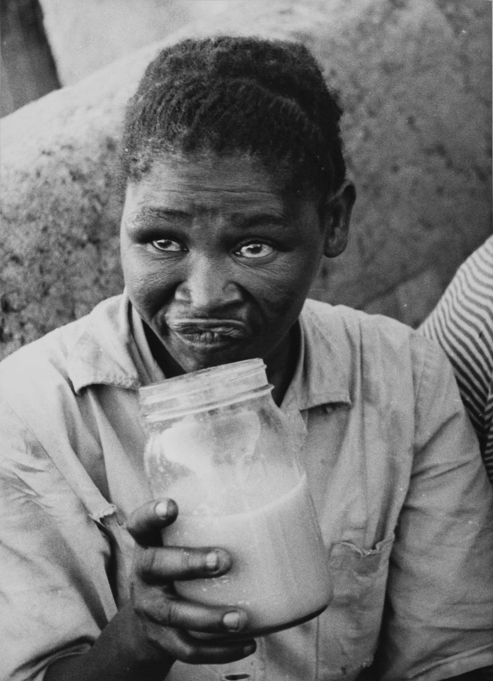 ERNEST COLE (1940–1990): ERNEST COLE (1940–1990) | Shebeen, from the series for 'House of Bondage', South Africa c. 1965 Image Size: c. 18 x 25 cm English Rare vintage gelatin silver print on single-weight, glossy