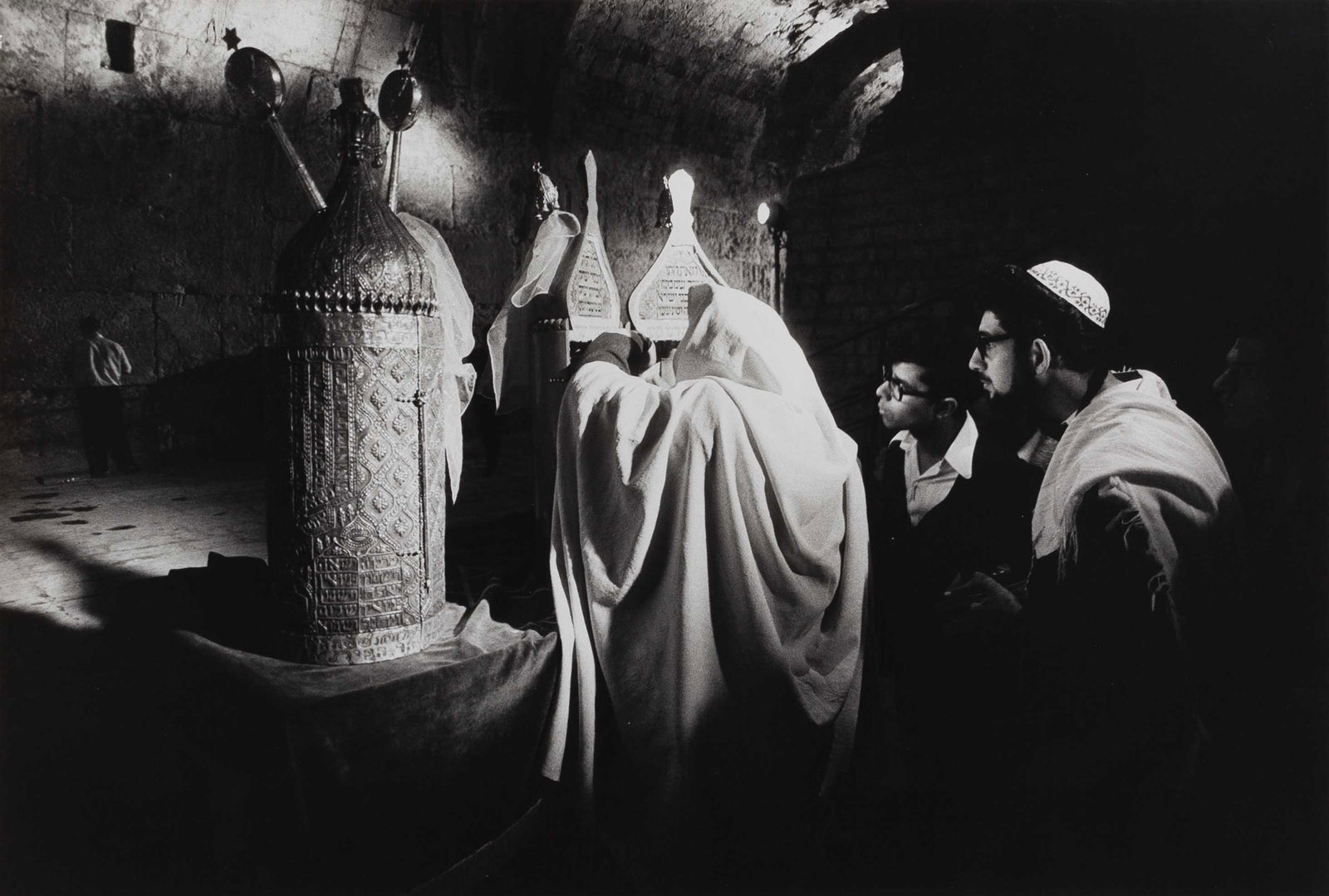 LEONARD FREED (1929–2006): LEONARD FREED (1929–2006) | Reading from the Sephardic Torah scroll, from the portfolio 'Jerusalem - City of Mankind', Israel 1973 Image Size: 23.3 x 34.5 cm English Vintage gelatin silver