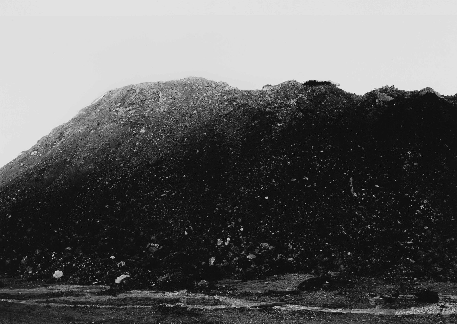 LEWIS BALTZ (1945–2014): LEWIS BALTZ (1945–2014) | Snowflower Condominiums, from the series 'Park City', Utah 1979 Image Size: c. 24 x 16 cm English Gelatin silver print, printed later on Agfa paper c. 20 x 25 cm, in