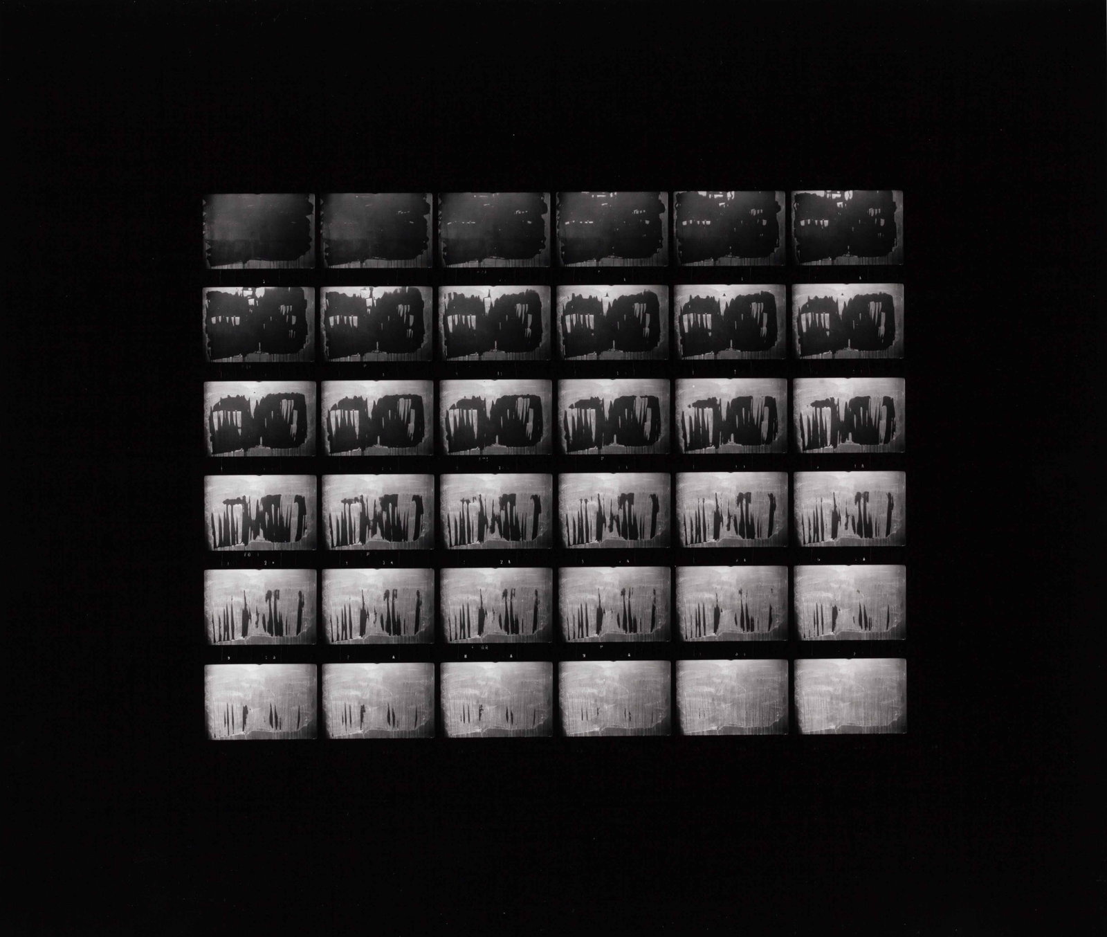 FRITZ SIMAK (*1955): FRITZ SIMAK (*1955) | 'Drying school blackboard', Vienna 1973 Image Size: c. 18 x 22.7 cm English Gelatin silver contact print with 36 exposures, c. 30 x 35 cm, in excellent condition. Photographer's