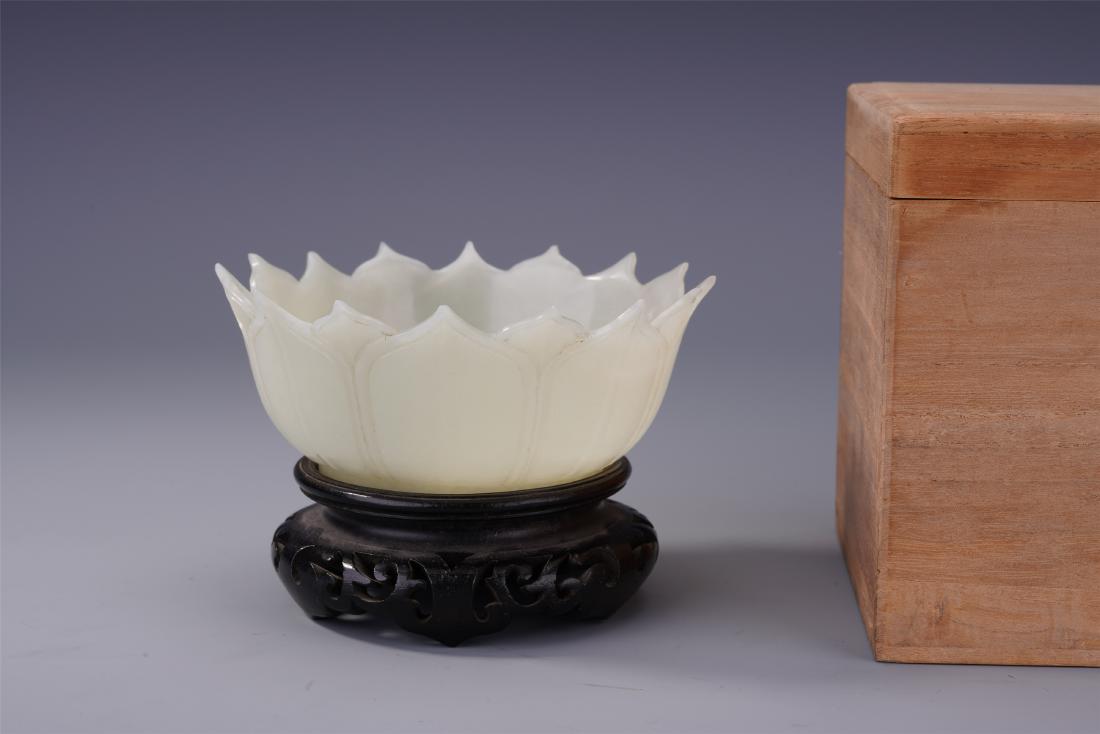 CHINESE WHITE JADE LOTUS SHAPED BOWL QING DYNASTY: CHINESE WHITE JADE LOTUS SHAPED BOWL QING DYNASTY. 11.5 cm by 7 cm. Weight 174 gram. Shipping cost $30 to any USA 48 states and $100 oversea shipping. Our package processing time range is 2wk to 4wk. 