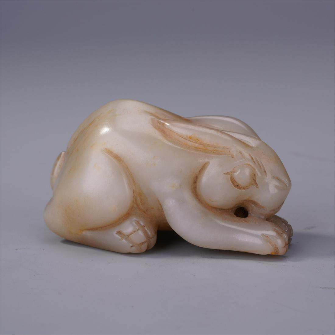 CHINESE JADE RIBBIT: CHINESE JADE RIBBIT. 10 cm by 6.5 cm by 3.5 cm. Weight 117 gram. Shipping cost $30 to any USA 48 states and $100 oversea shipping. Our package processing time range is 2wk to 4wk. Items to some Asian 
