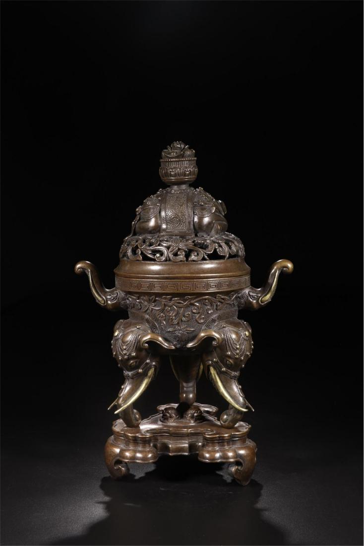 CHINESE BRONZE ELEPHANT TRUNK FEET LIDDED CENSER: CHINESE BRONZE ELEPHANT TRUNK FEET LIDDED CENSER. H.36 cm. Ear distance21.3 cm. Diam. 14.4 cm. Weight 5410 gram. Shipping cost $50 to any USA 48 states and $150 oversea shipping. Our package processin