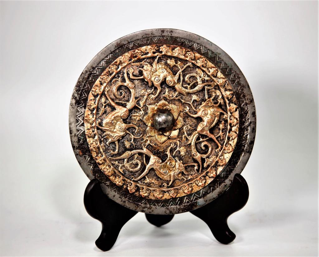 Chinese circular archaistic metal mirror (1 of 2)