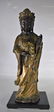 Tang Dynasty, A.D. 8th Century A Gilt Bronze Figure