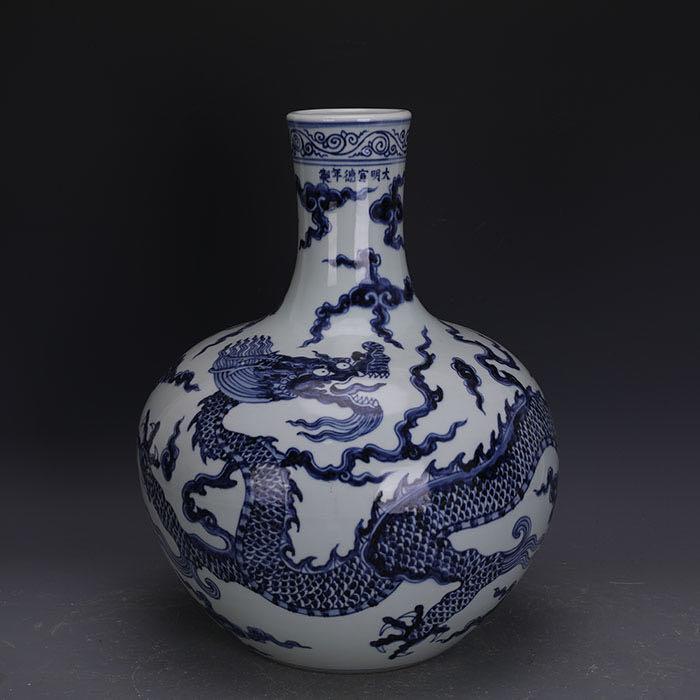 Ming Dynasty Blue and White Porcelain Bottle: Ming Dynasty blue and white porcelain bottle vase,with Xuande mark on neck of vase; Approx. H: 43cm