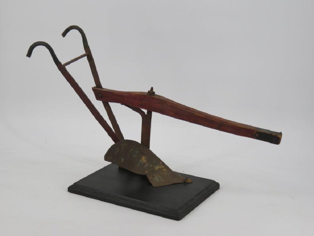 Early walk-behind plow sample on mount c. 1890 (1 of 3)