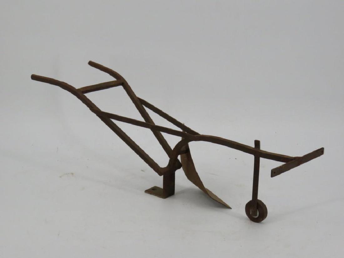Steel plow sample display c. 1890 (1 of 3)