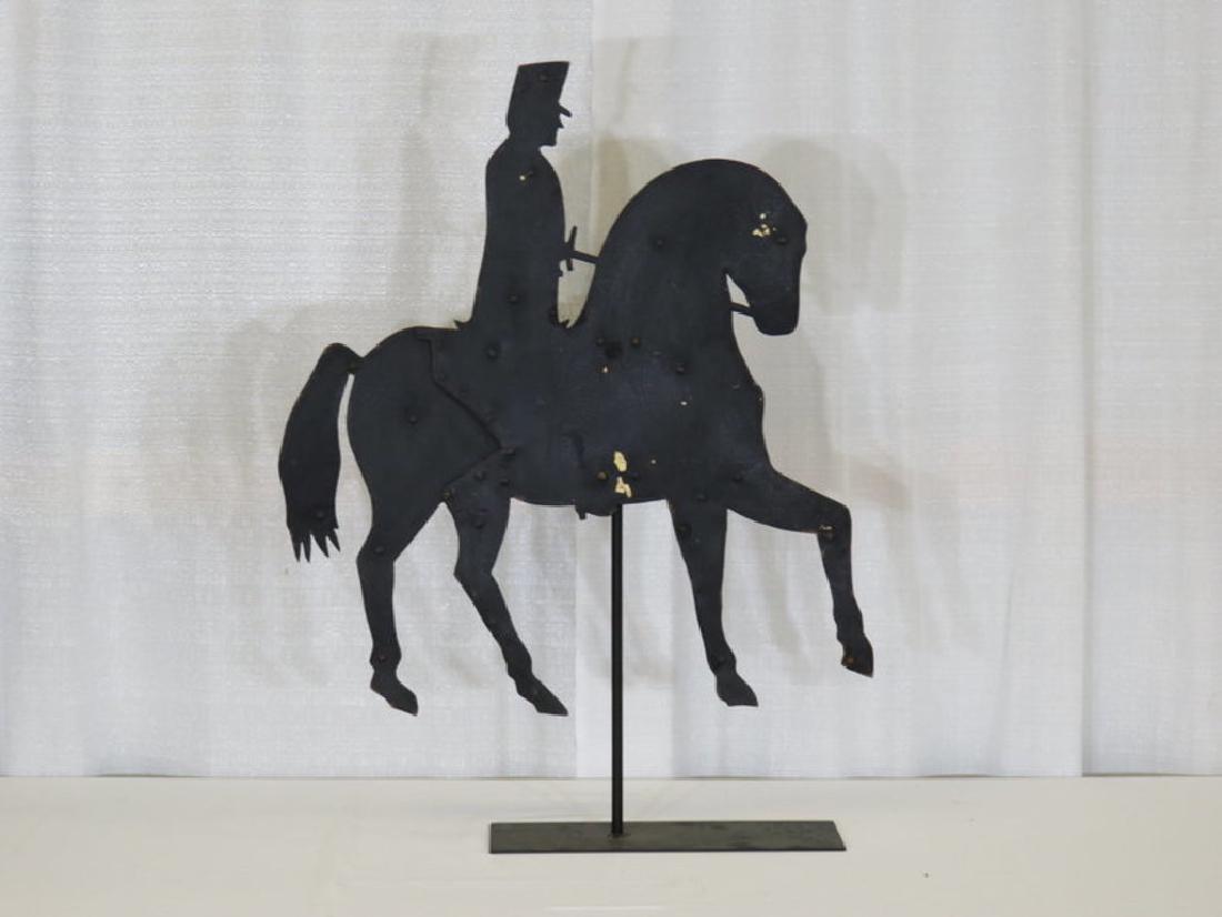 Sheet iron horse/rider silhouette on base c. 1870 (1 of 2)