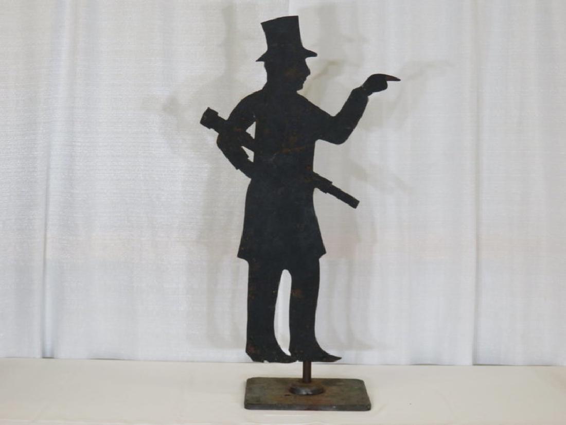 Sheet iron vane of gentlemen with spy glass on base c. (1 of 2)